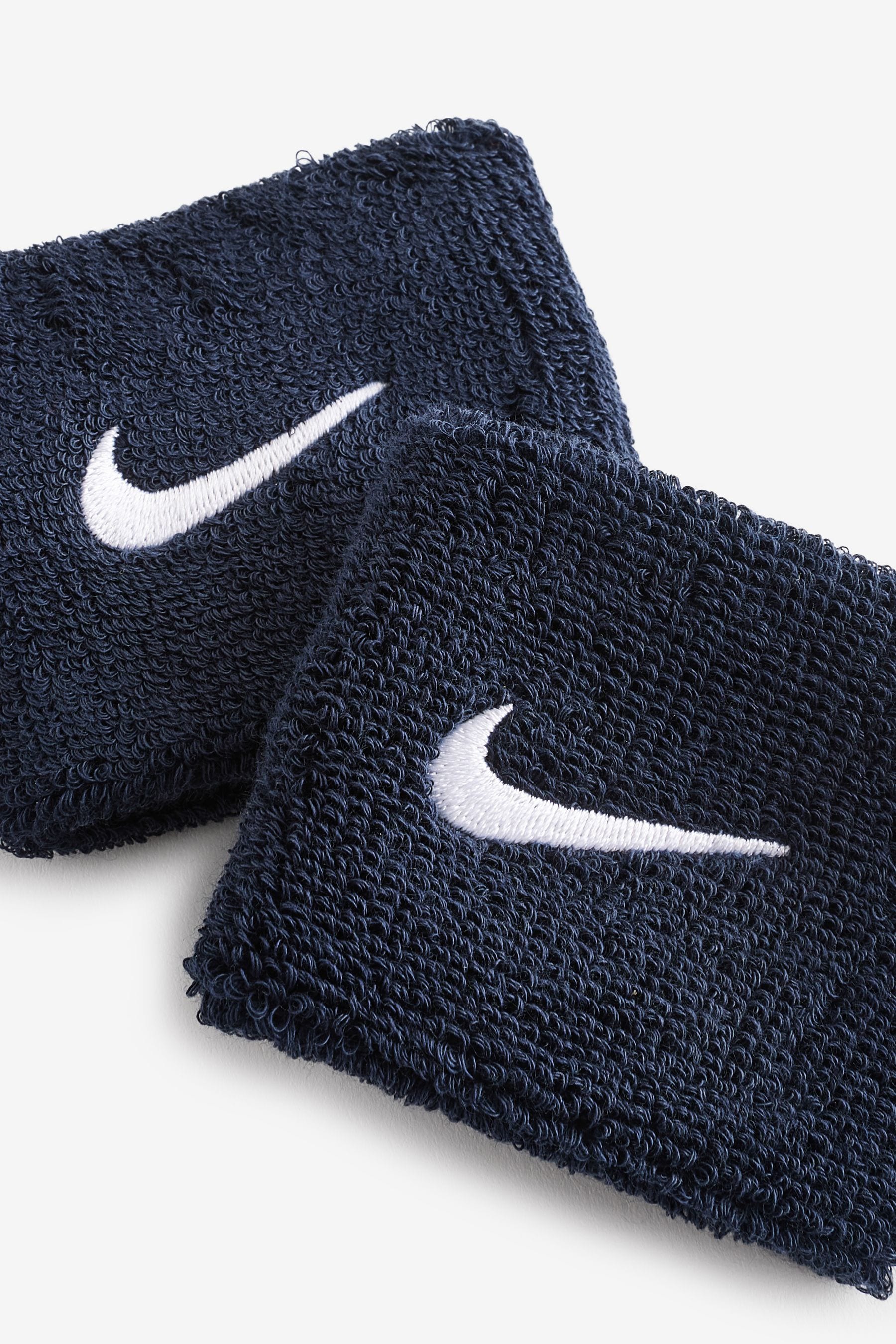 Buy Nike Dark Blue Swoosh Wristband from the Next UK online shop