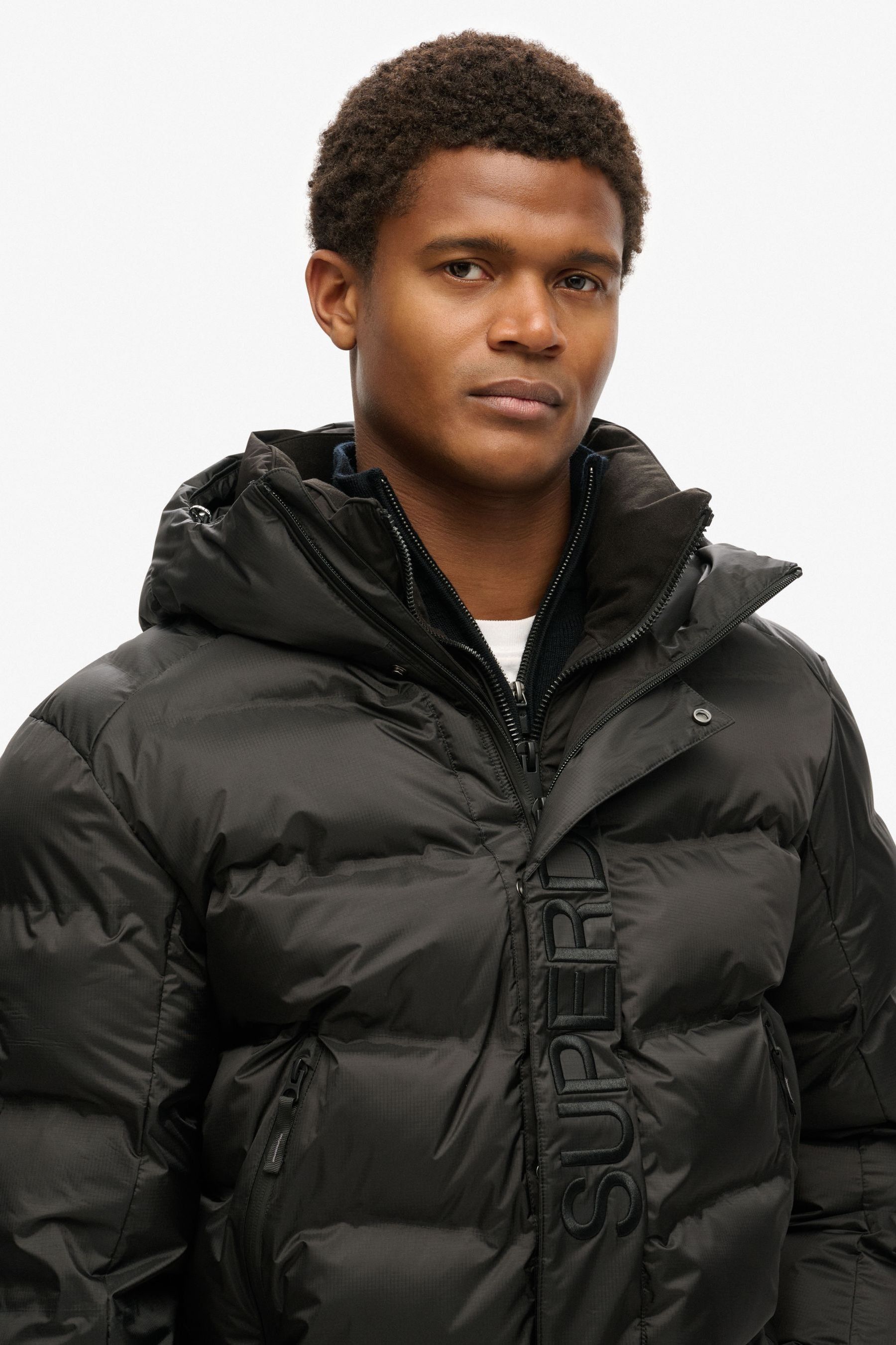 Buy Superdry Black Hooded City Graphic Puffer Jacket from the Next UK online shop