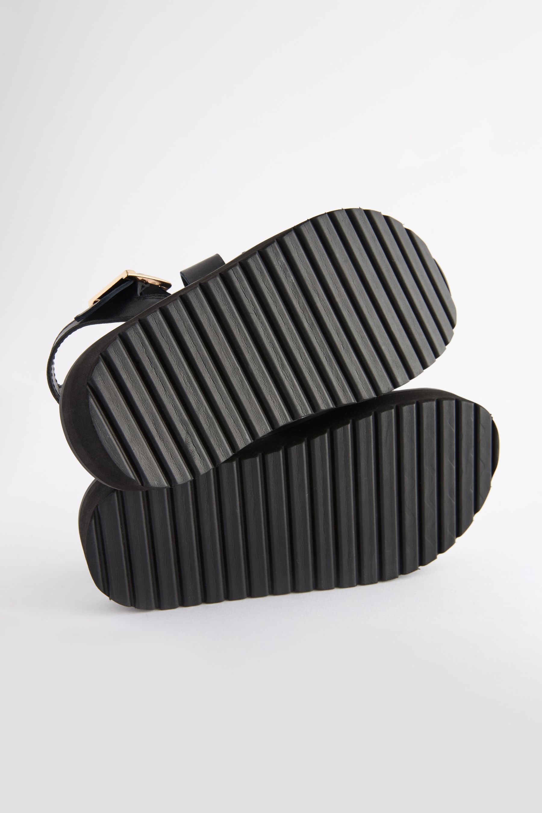 Chunky black leather sandals top