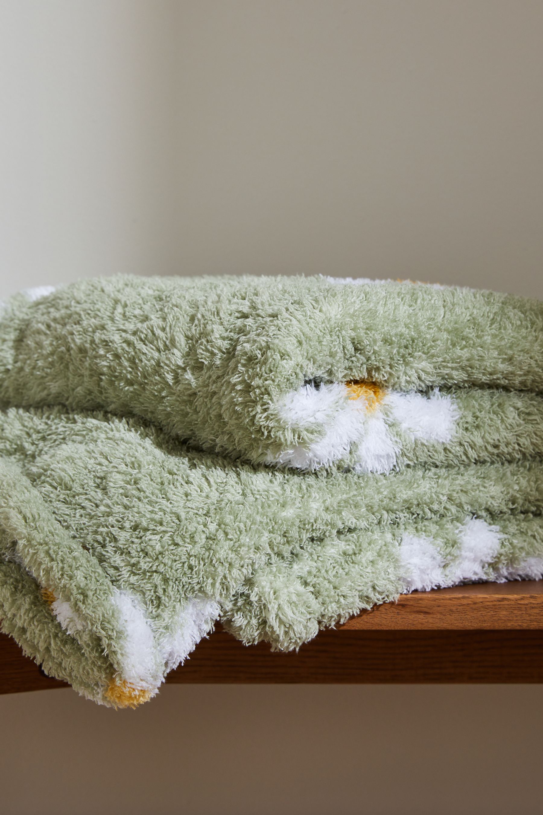 Buy Sage Green Daisy Fleece Throw from the Next UK online shop