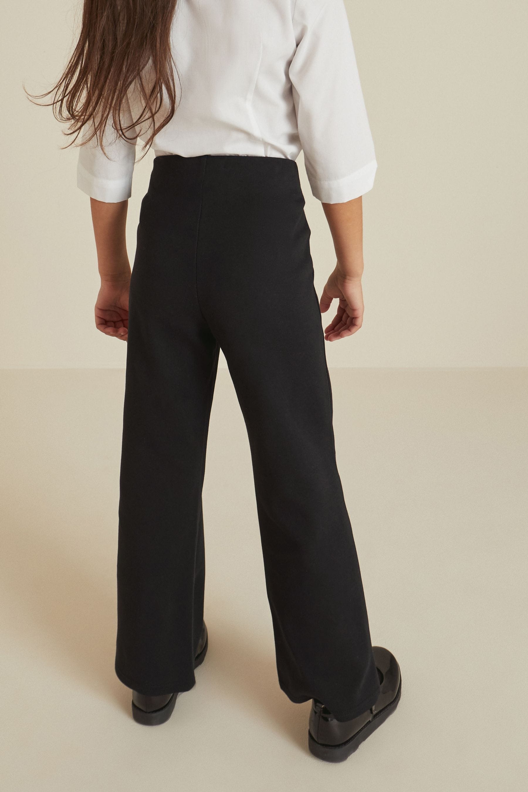 Boot leg trousers top