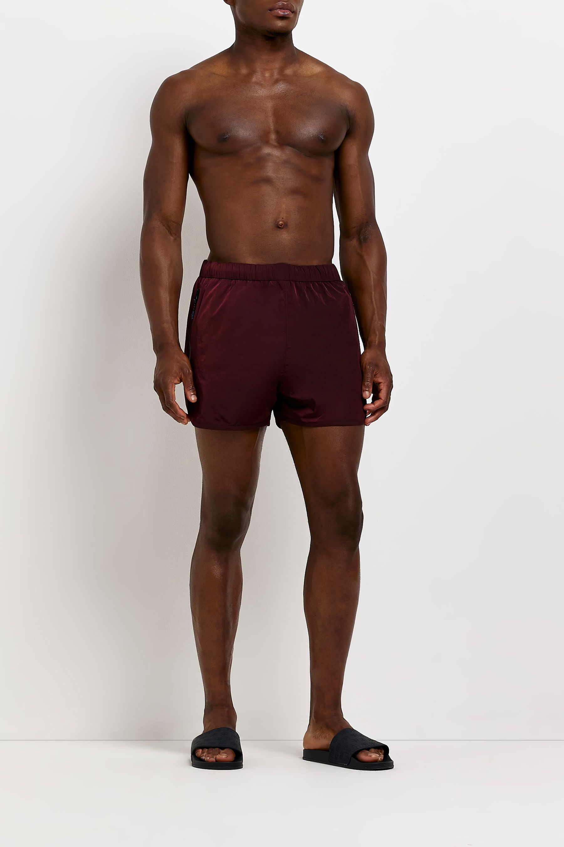 Buy River Island Red Iridescent Runner Swim Shorts from Next Luxembourg