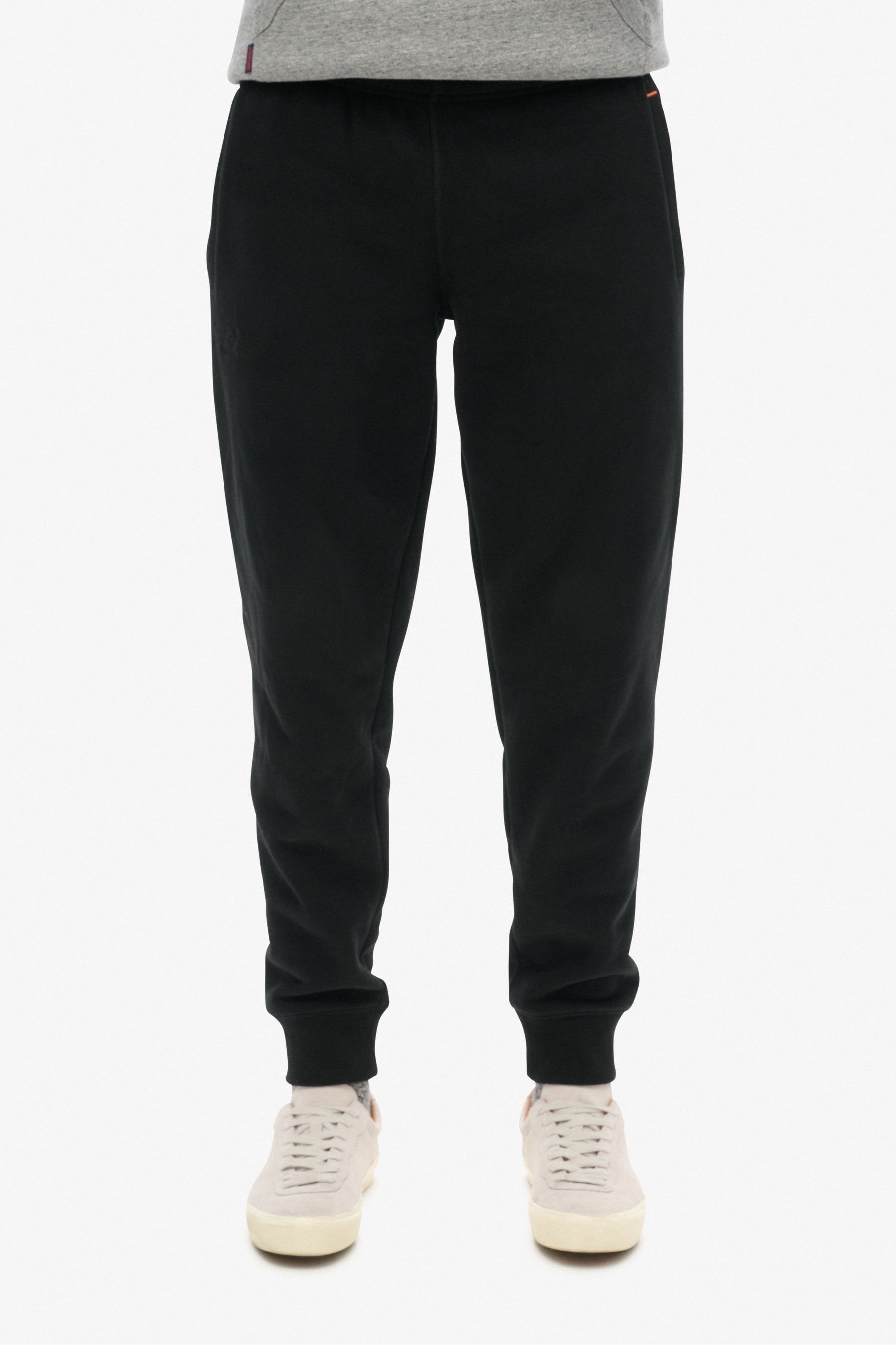 Superdry black joggers discount