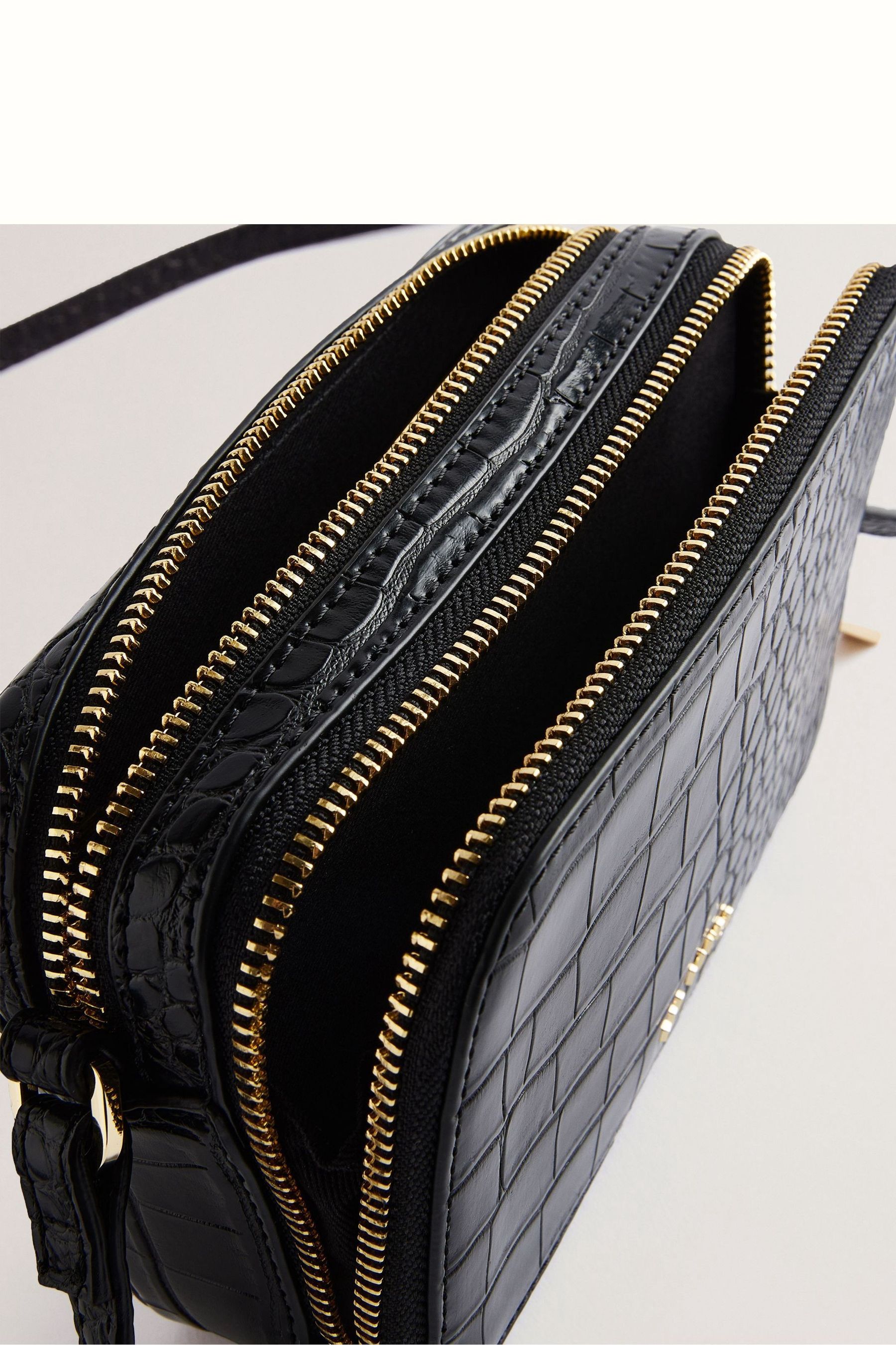 Buy Ted Baker Black Stina Double Zip Mini Camera Bag from Next Luxembourg
