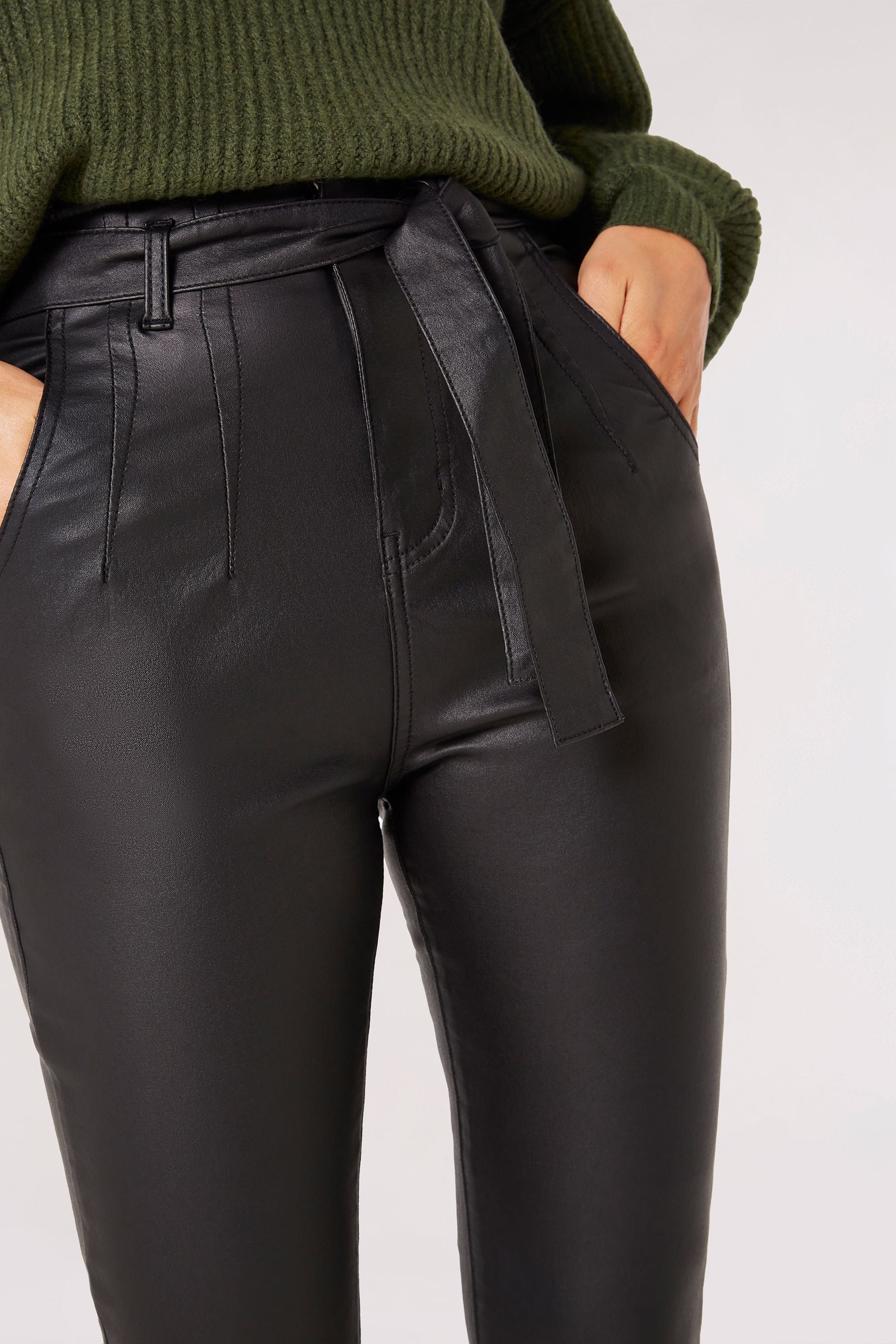 Buy Apricot Black Leather Look Belted Trousers from the Next UK