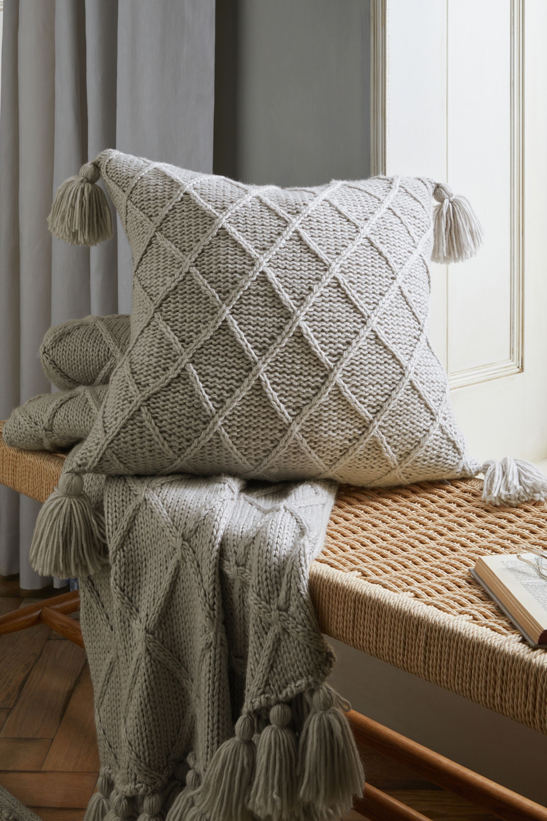 Grey tassel cushion shop