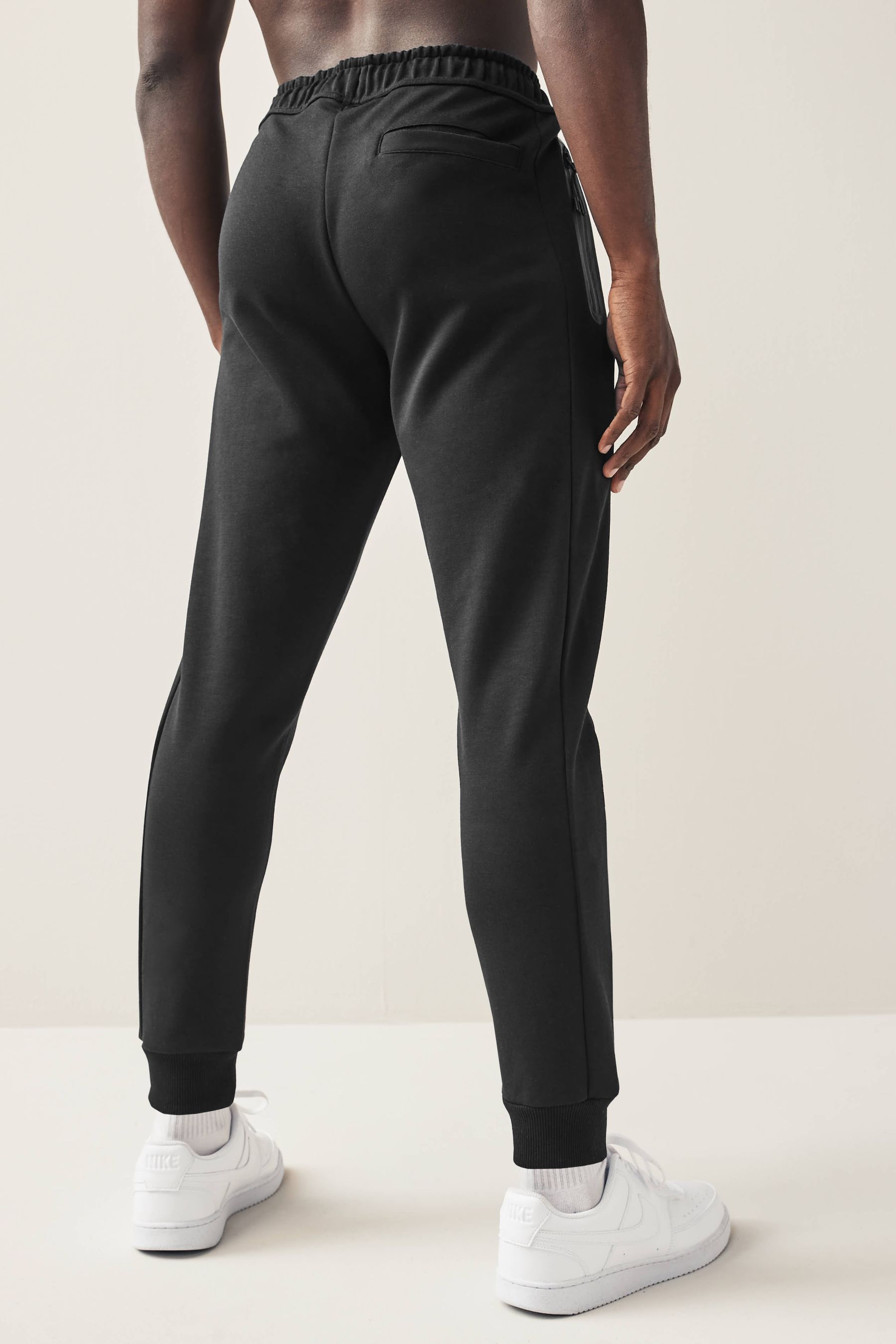 Buy Black Athleisure Cuffed Joggers from the Next UK online shop