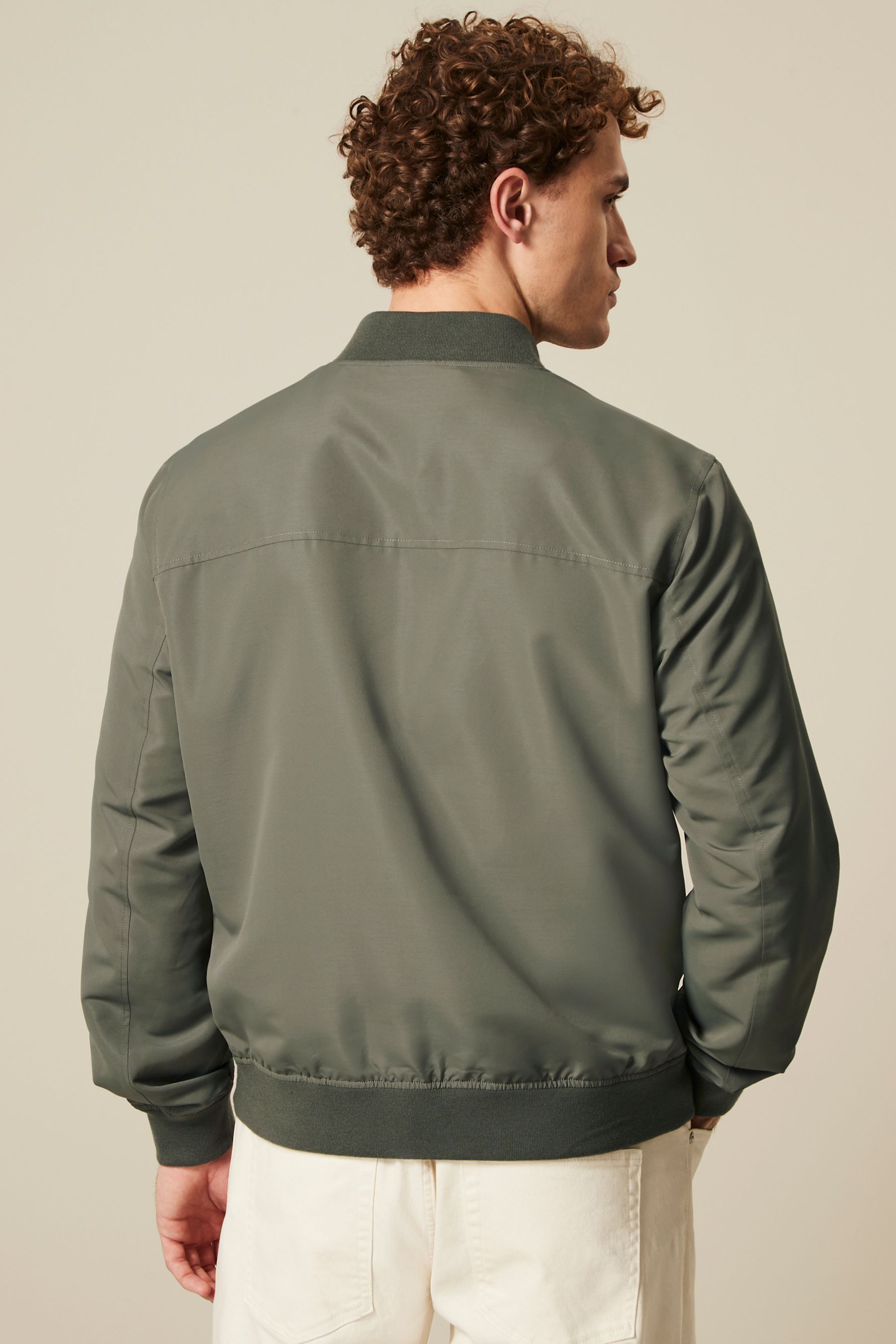 Buy Sage Green Shower Resistant Bomber Jacket from Next Germany