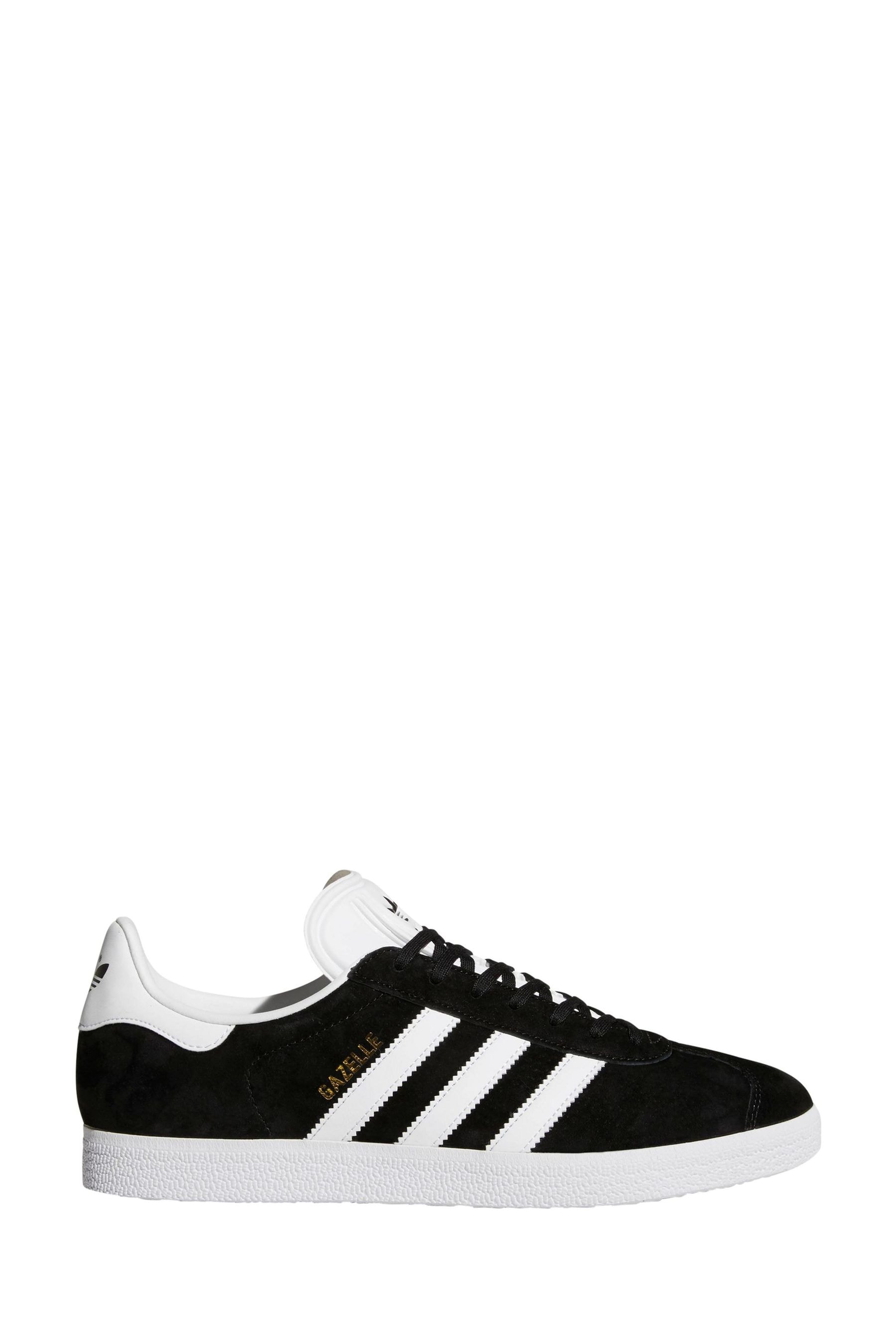 Black and white shop adidas originals gazelle trainers