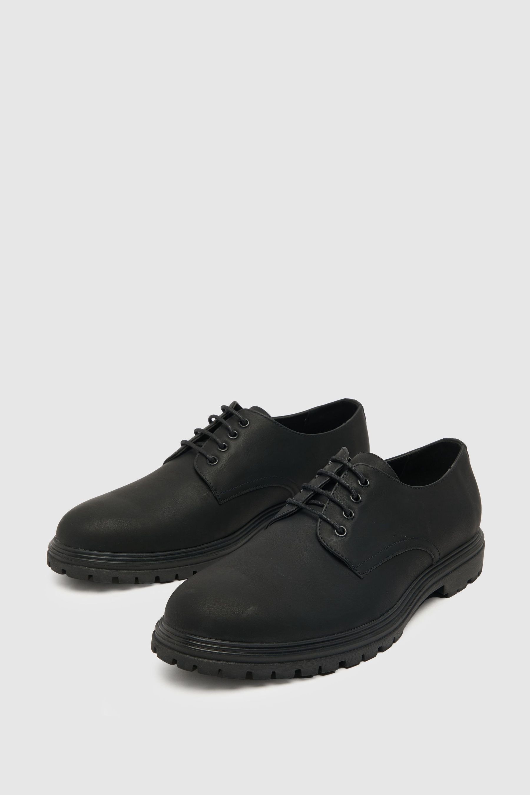 Schuh black shoes clearance