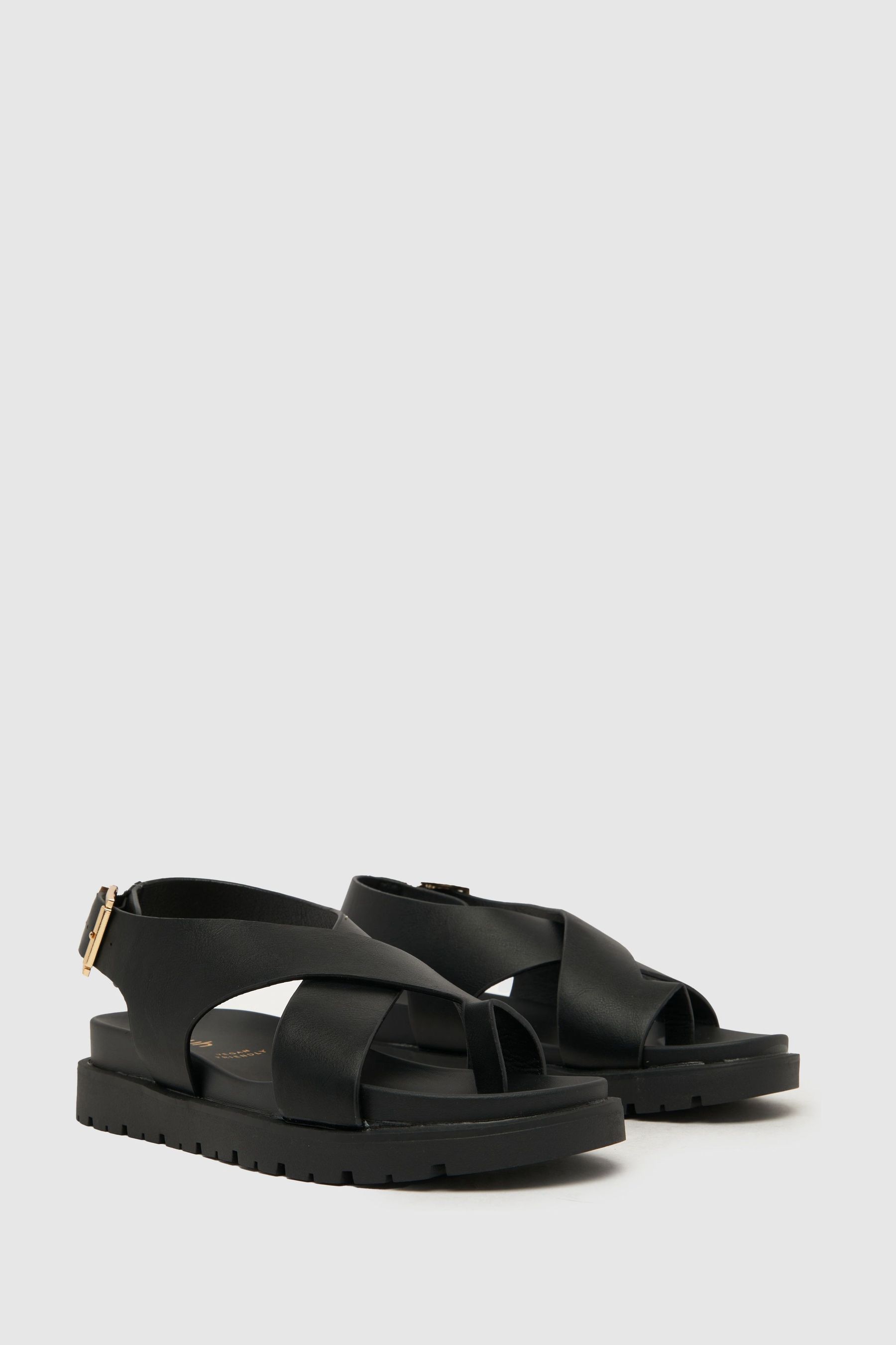 Black toe loop sandals top