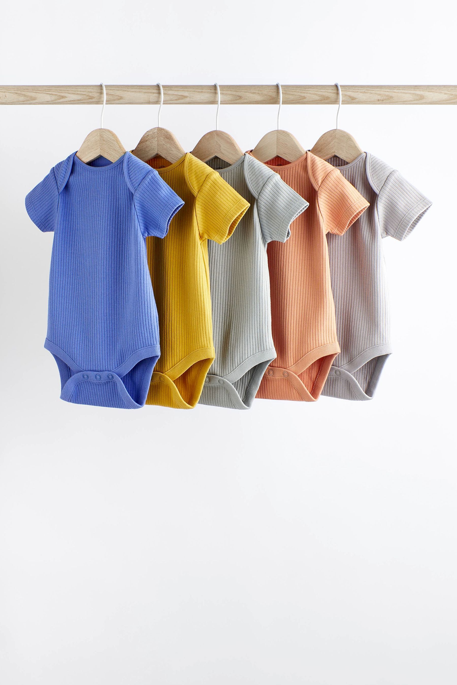 Buy Multi Plain Rib Baby Bodysuits 5 Pack from Next Germany