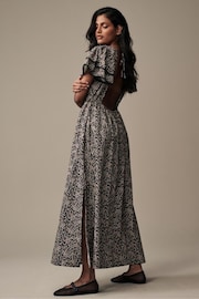 Laura Ashley Black Morston Ditsy Backless Maxi Dress - Image 1 of 6