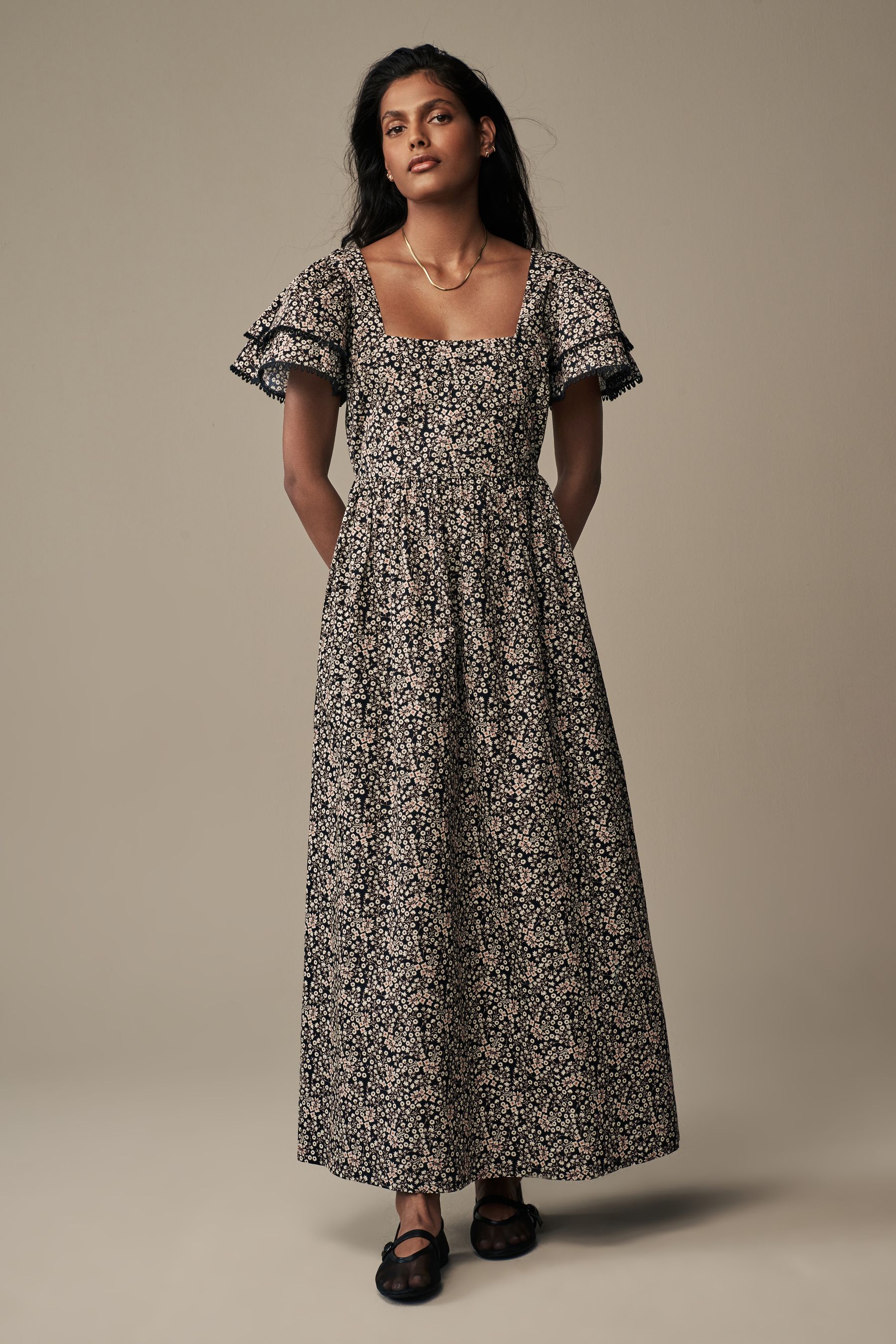 Buy Laura Ashley Black Morston Ditsy Backless Maxi Dress from the Next ...