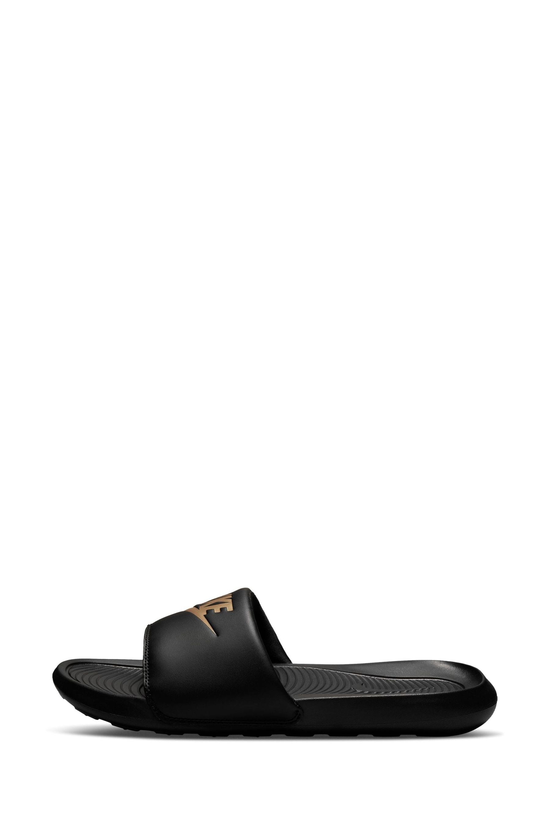 Buy Nike Black Gold Victori One Sliders from the Next UK online shop