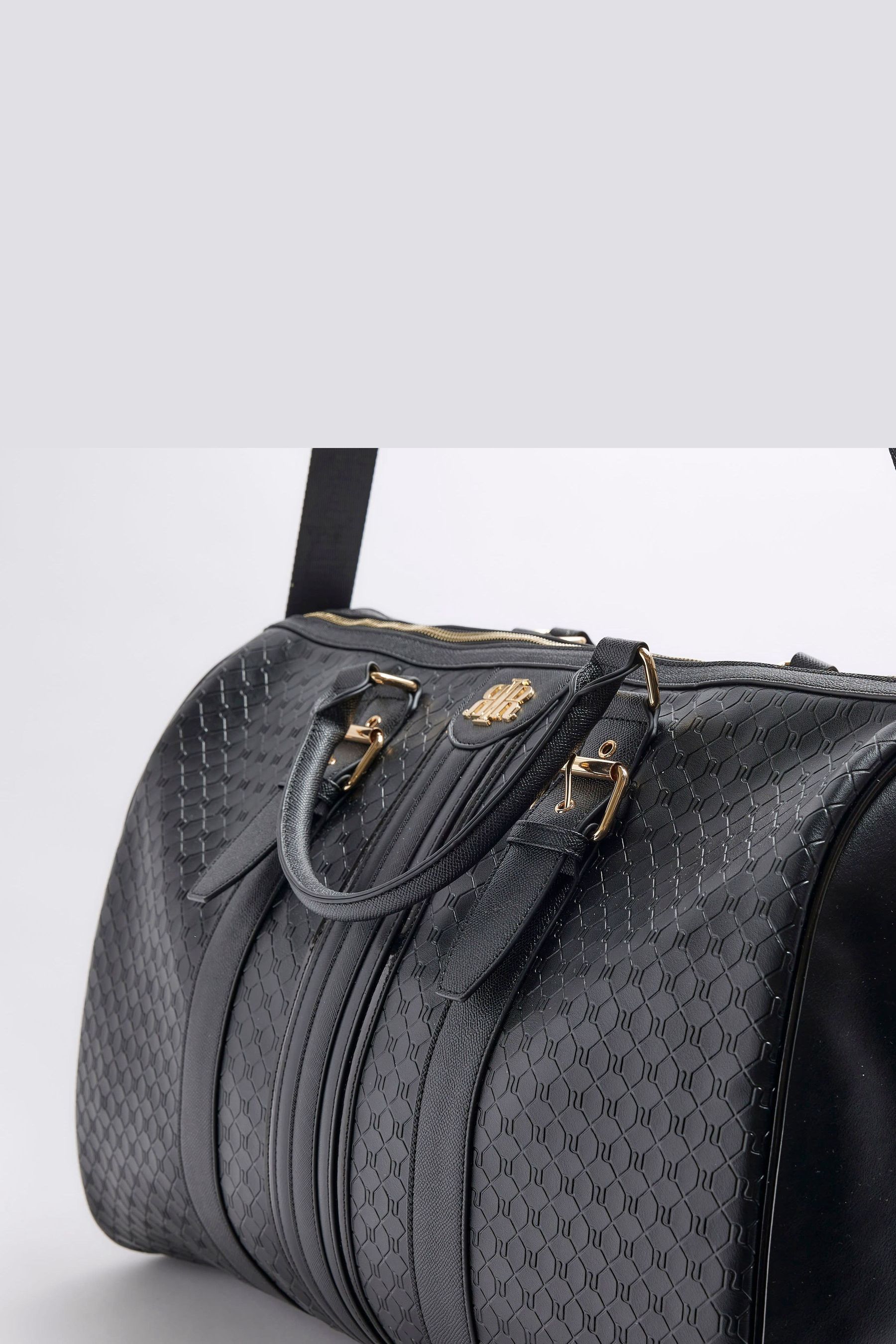 Buy River Island Black Oversized Embossed Monogram Barrel Bag from Next Luxembourg
