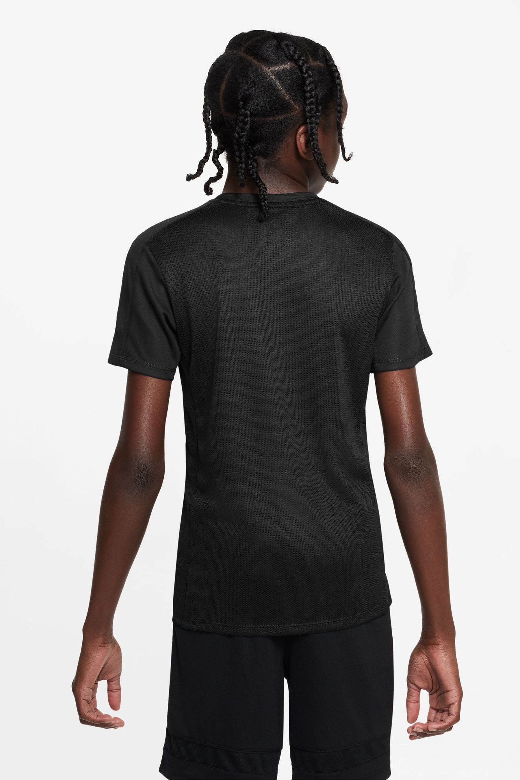 Boys black and gold nike shirt store