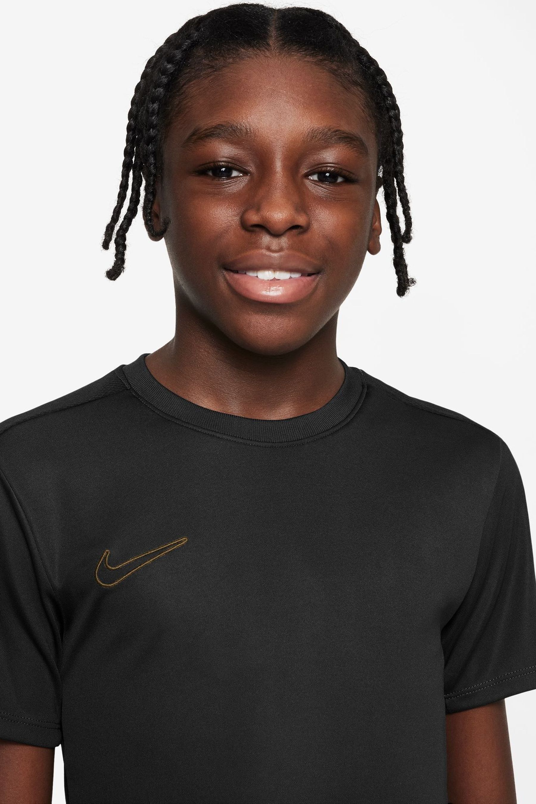 Boys black and gold nike shirt 2025