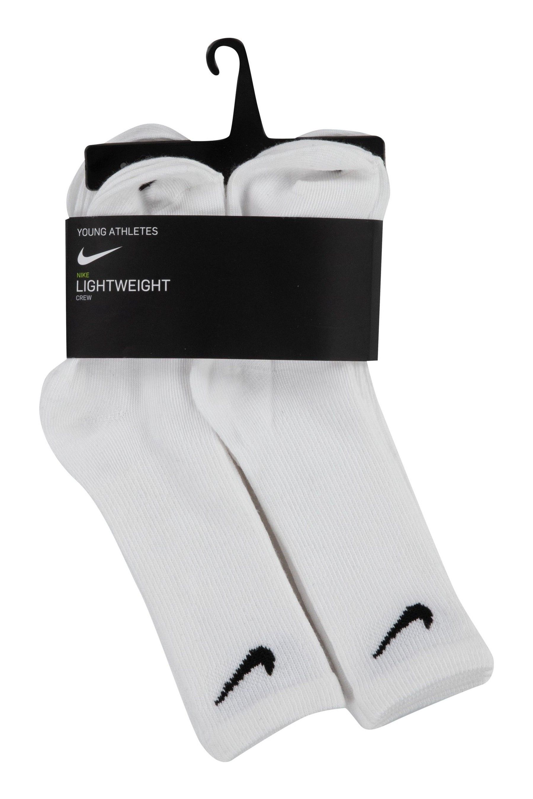 Kids white nike socks shop