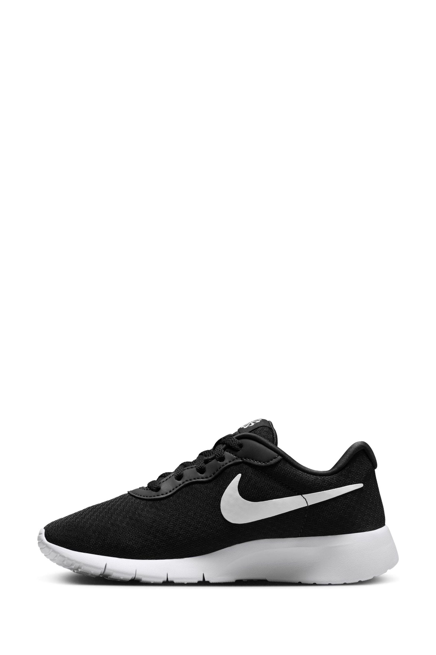 Buy Nike Black White Youth Tanjun GO Trainers from the Next UK online shop