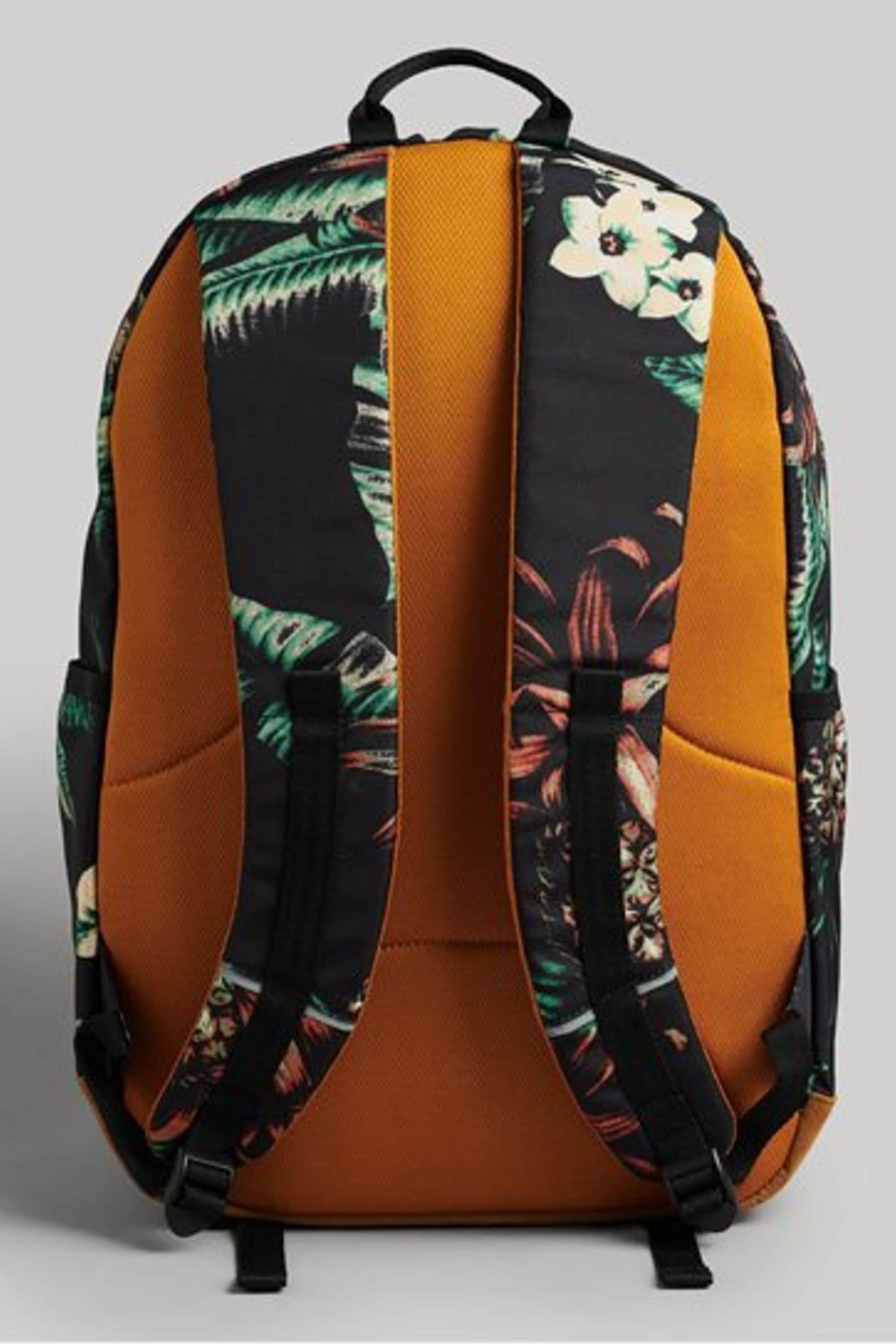 Superdry black and orange backpack on sale