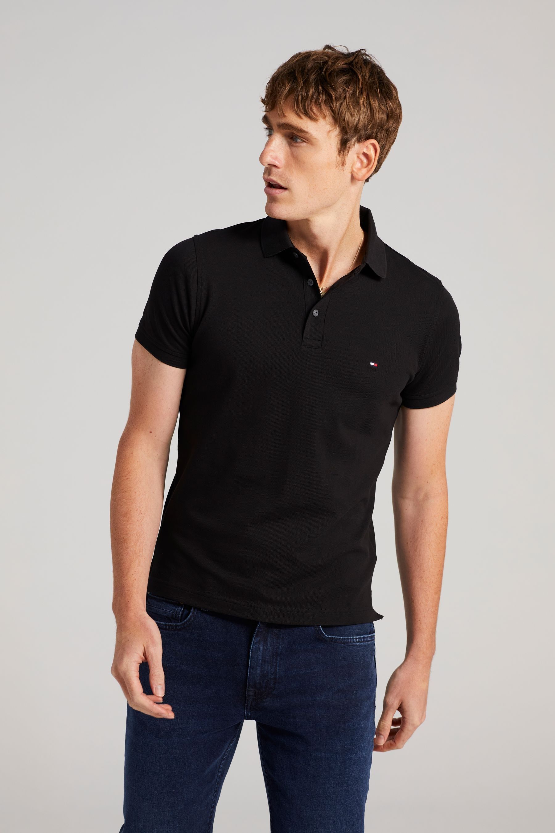 Buy Tommy Hilfiger Black 1985 Slim Polo Shirt from the Next UK online shop