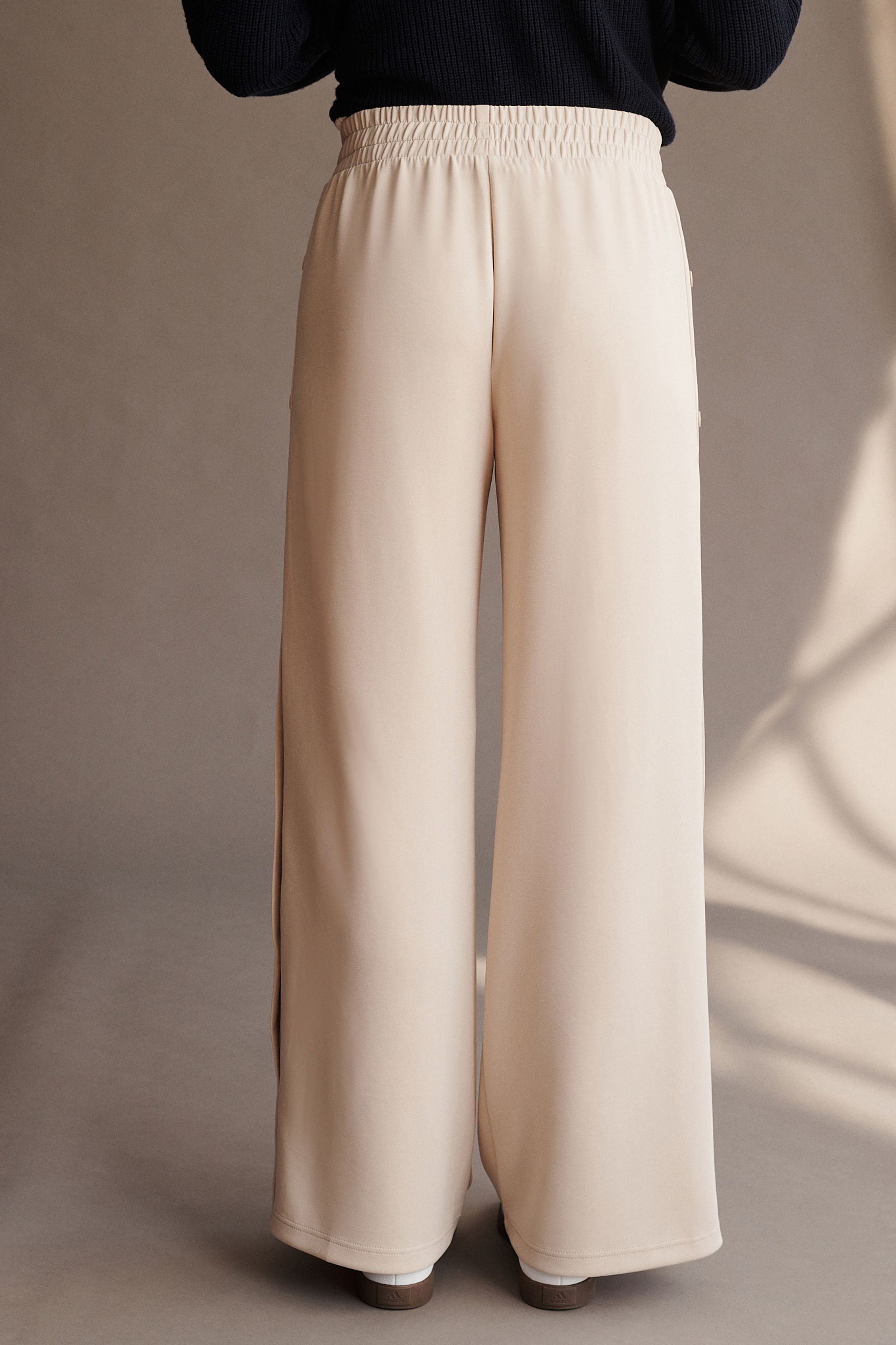Buy Neutral Soft Jersey Popper Side Trousers from the Next UK online shop