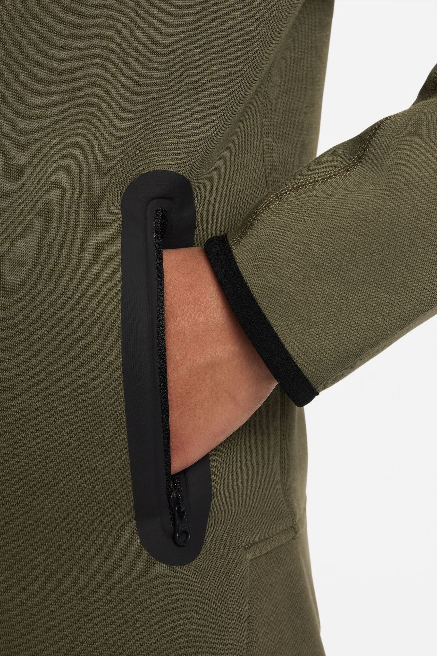 Olive green nike new arrivals jacket women's