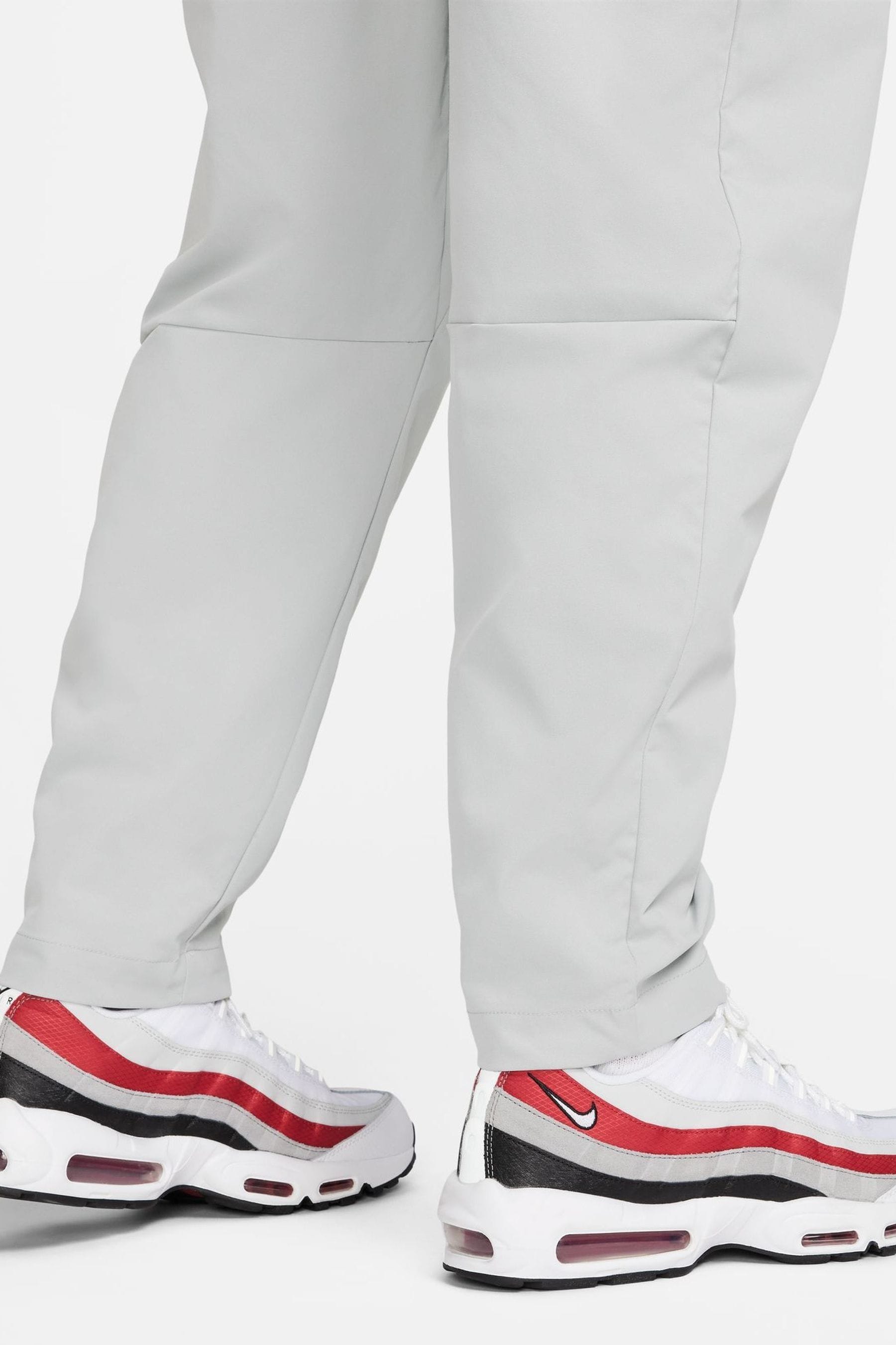 Buy Nike Grey Club Woven Tapered Joggers from the Next UK online shop