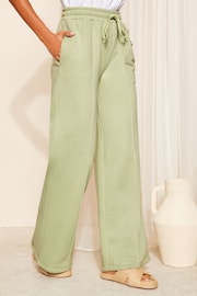 Friends Like These Green Wide Leg Jersey Co-Ord Trousers - Image 1 of 4
