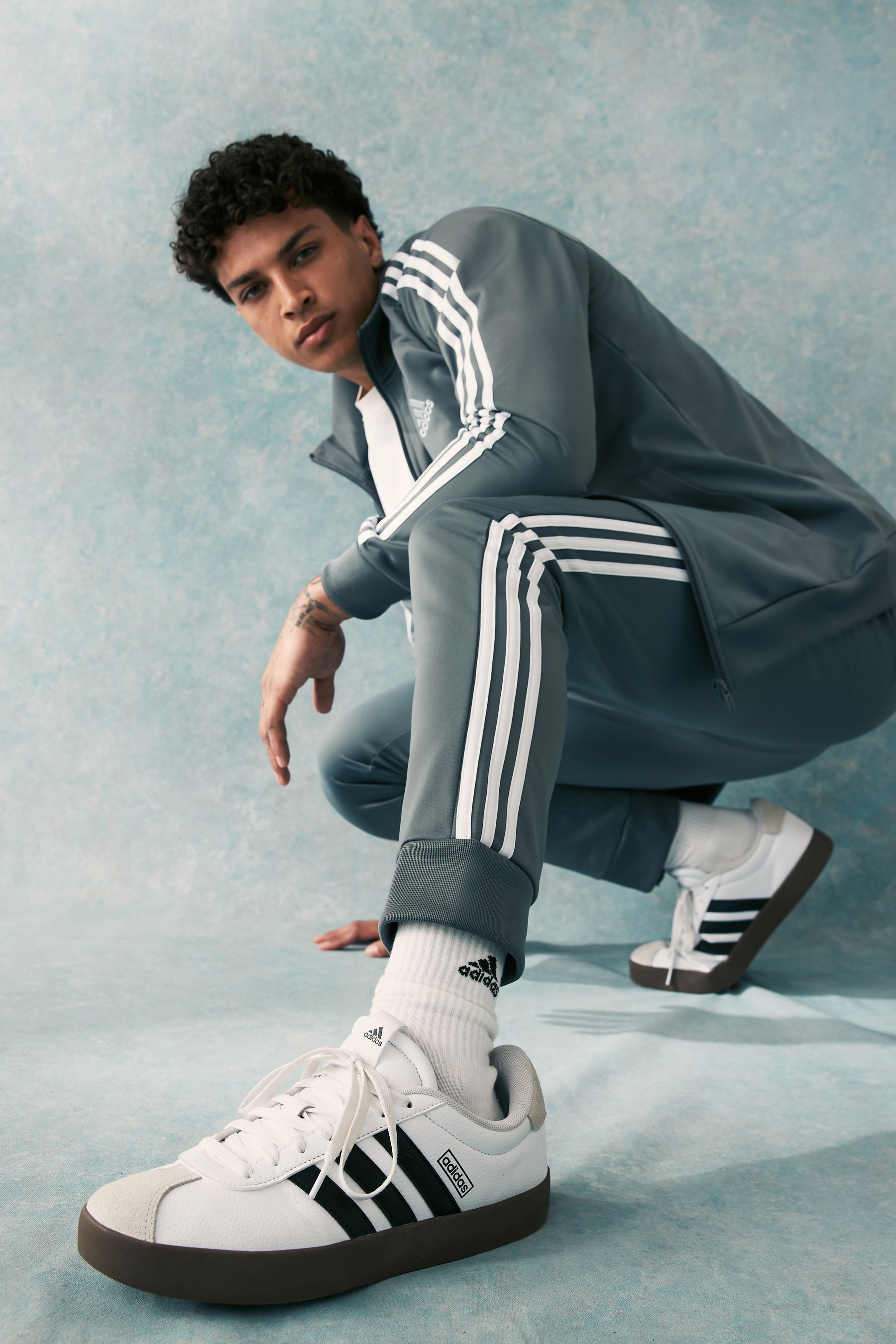 Grey tracksuit with green stripes online