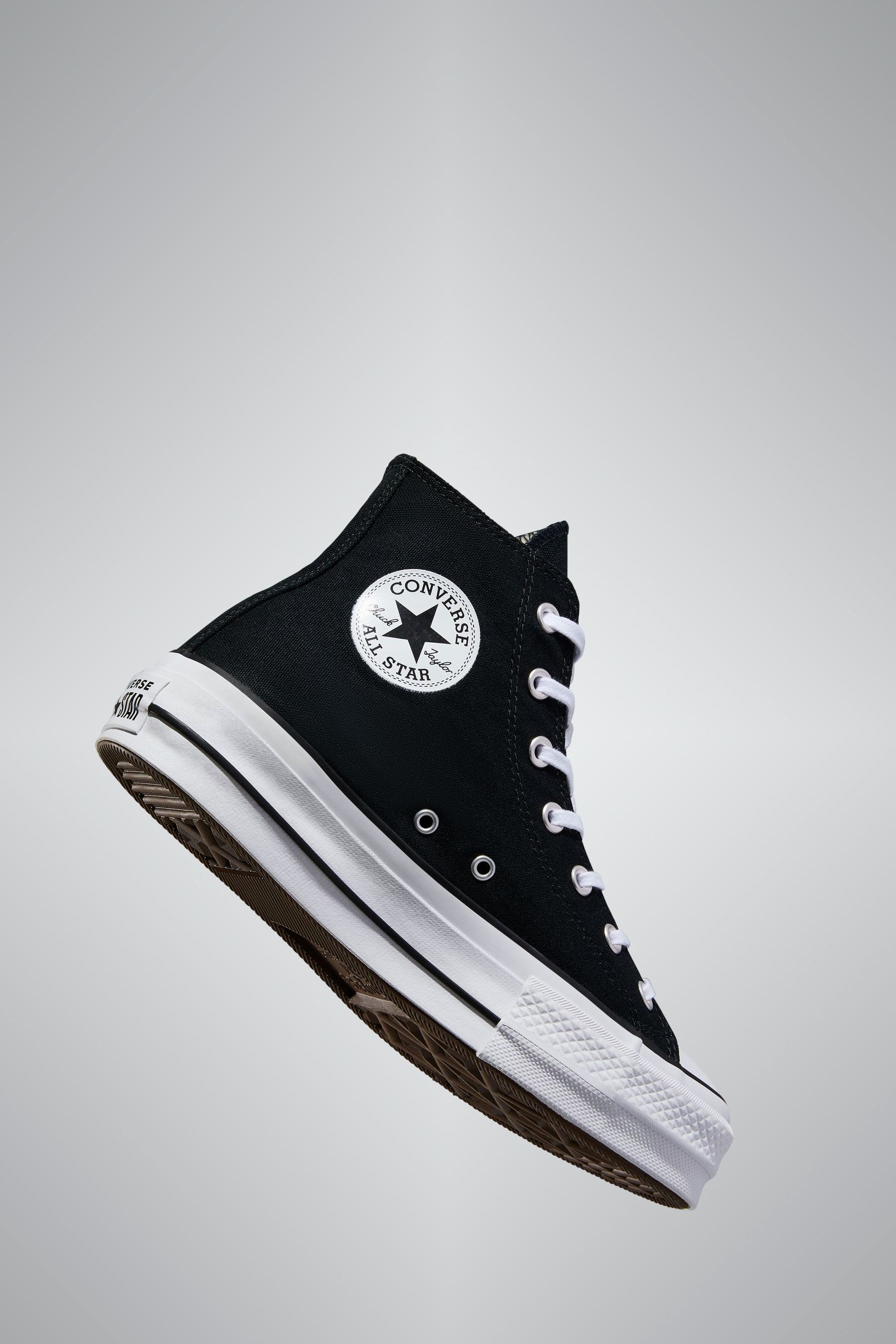Buy Converse Black Pale Platform Lift High Top Trainers from the