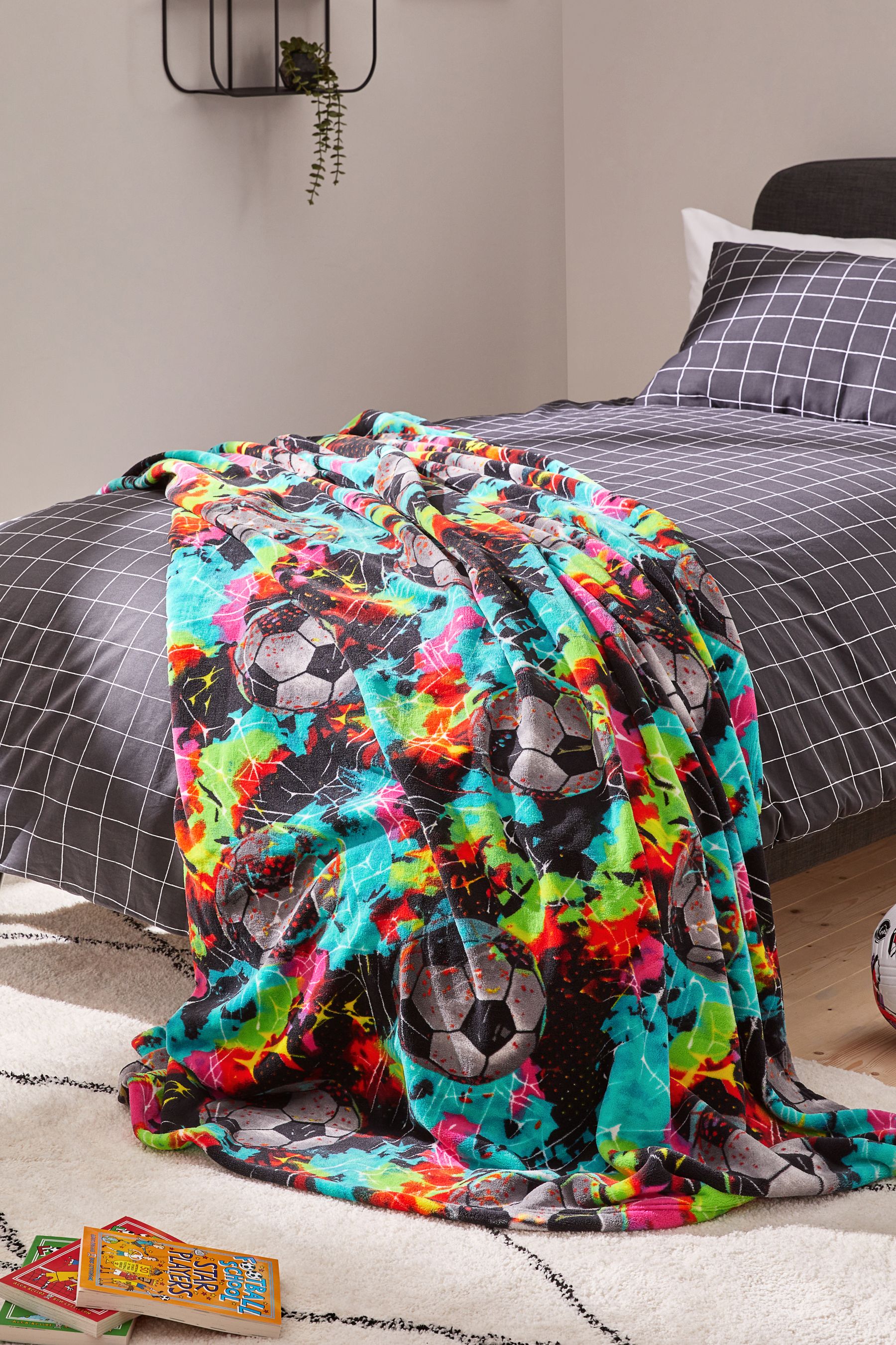 Buy Black Multi Football Super Soft Fleece Throw Blanket from the Next UK online shop