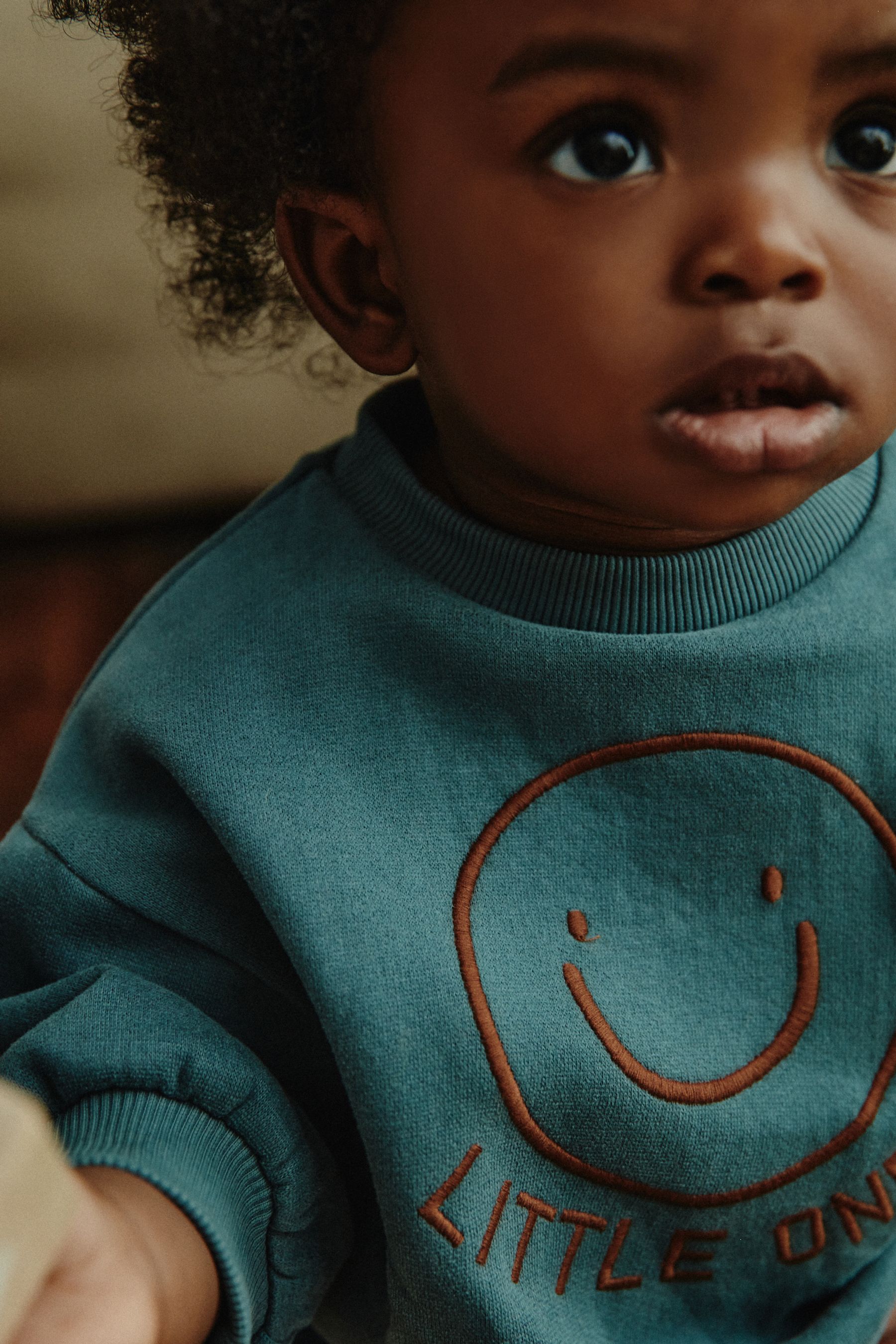 Buy Teal Blue Face Baby Sweatshirt and Joggers Set from the Next UK online shop