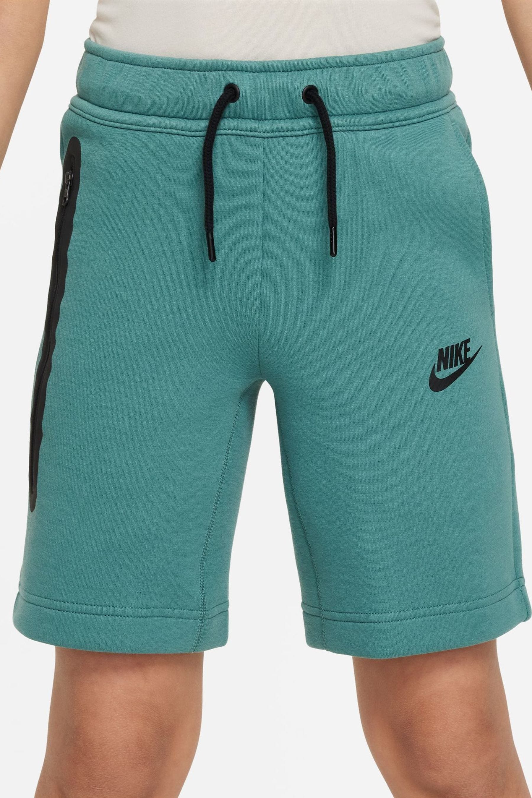 Buy Nike Green Tech Fleece Shorts from Next Poland