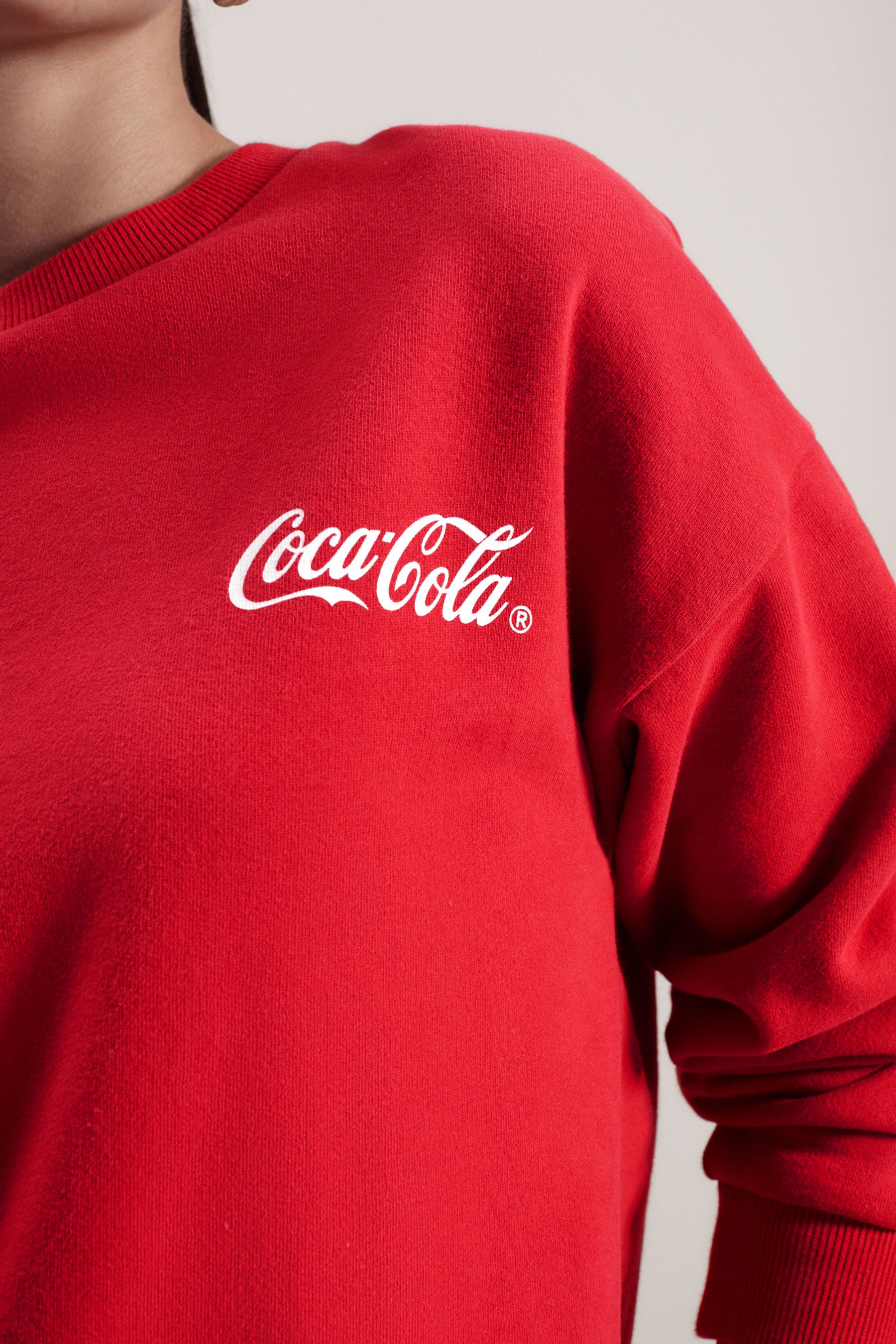 Buy Red License Coca Cola Christmas Graphic Crew Neck Sweatshirt from Next Luxembourg