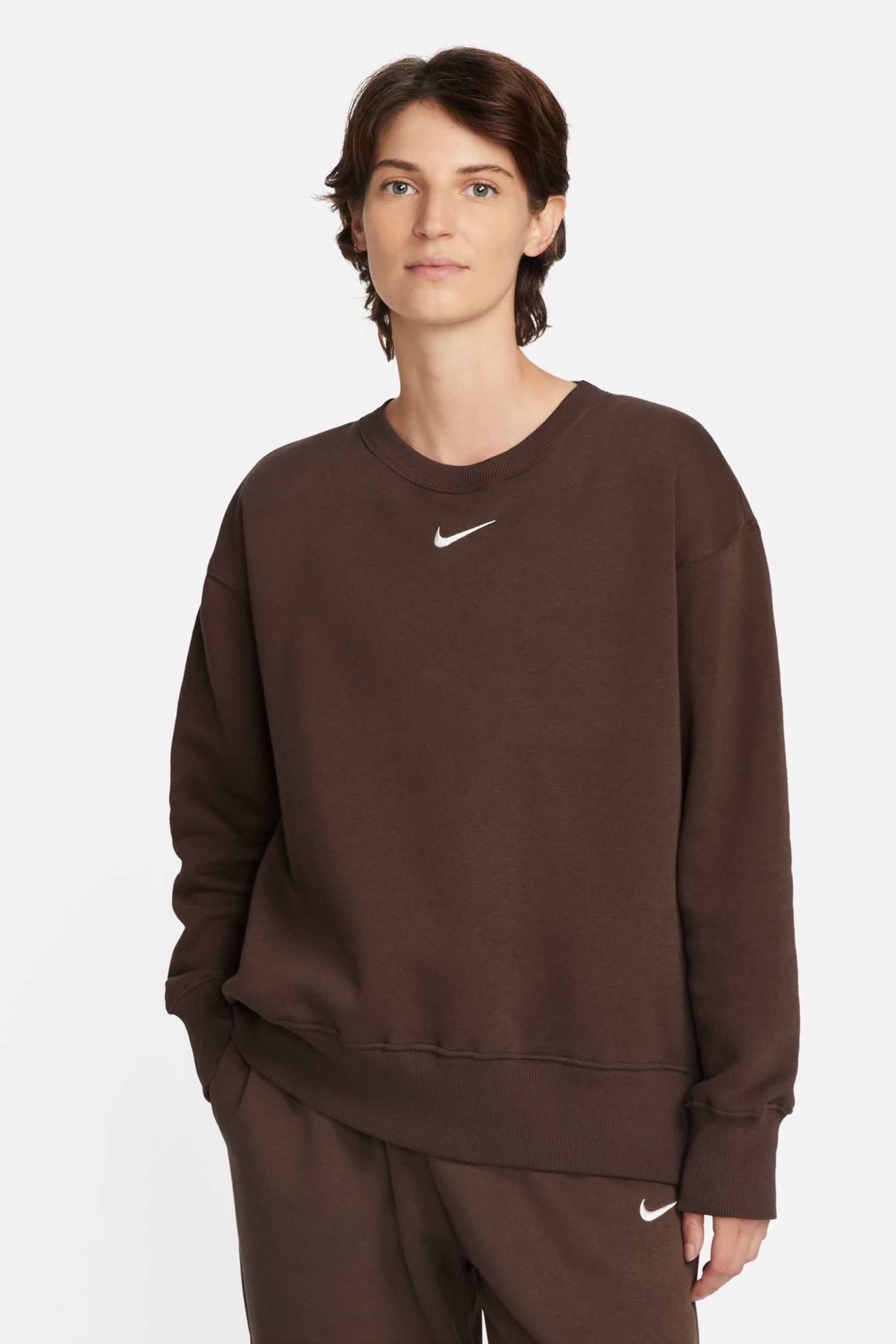 Nike mini swoosh oversized sweatpants in crea 2025