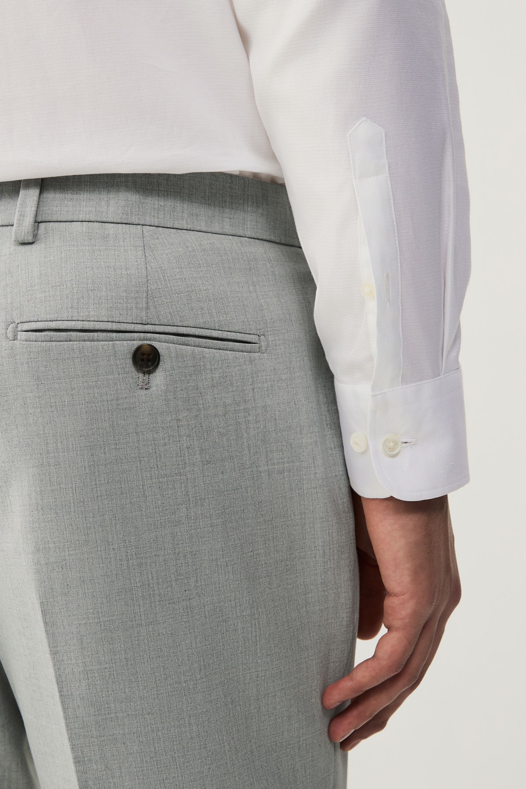 buy-light-grey-slim-fit-motionflex-stretch-suit-trousers-from-the-next
