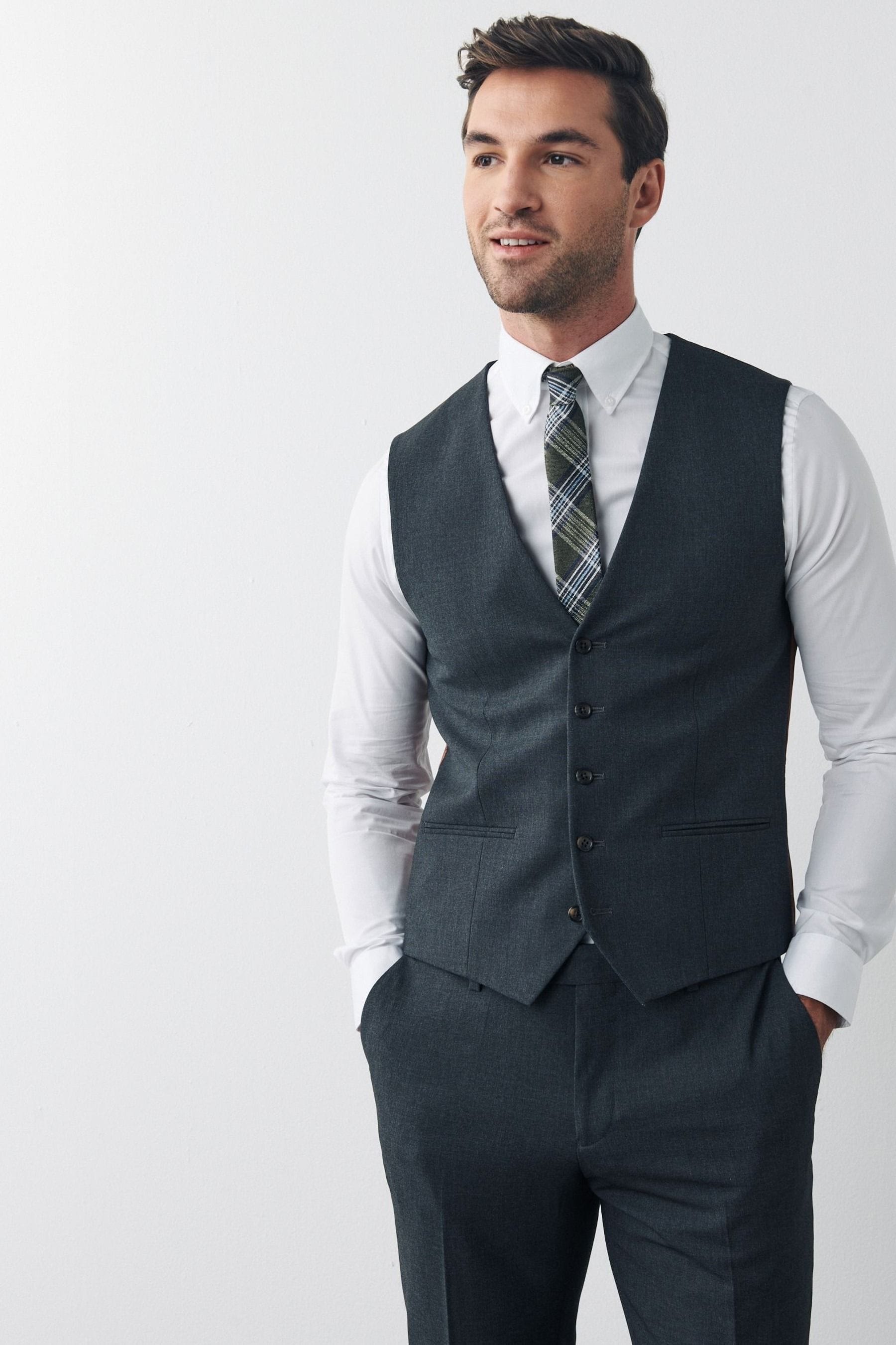 Buy Grey Regular Fit Motionflex Stretch Waistcoat from Next Oman