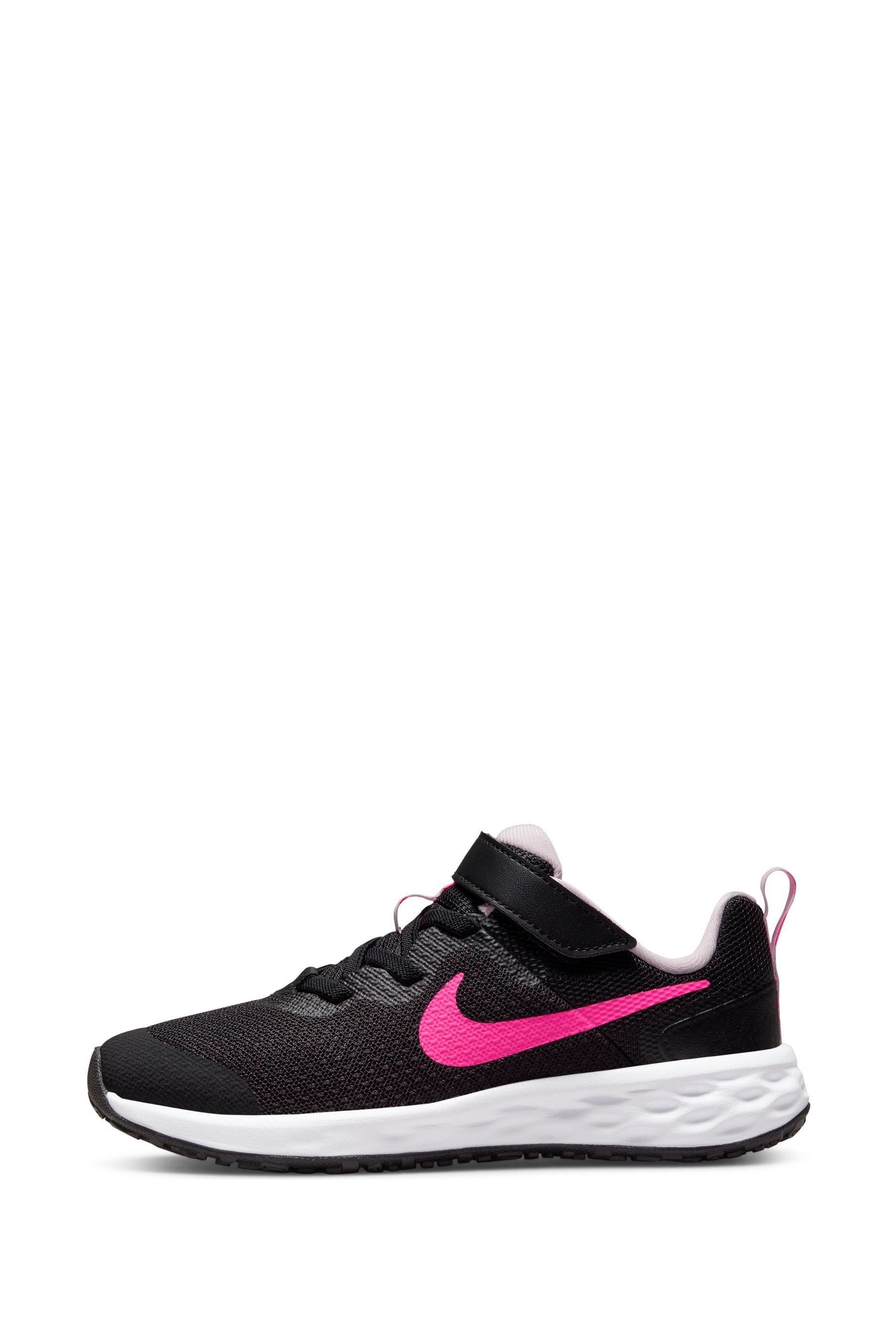 Nike revolution junior trainers discount