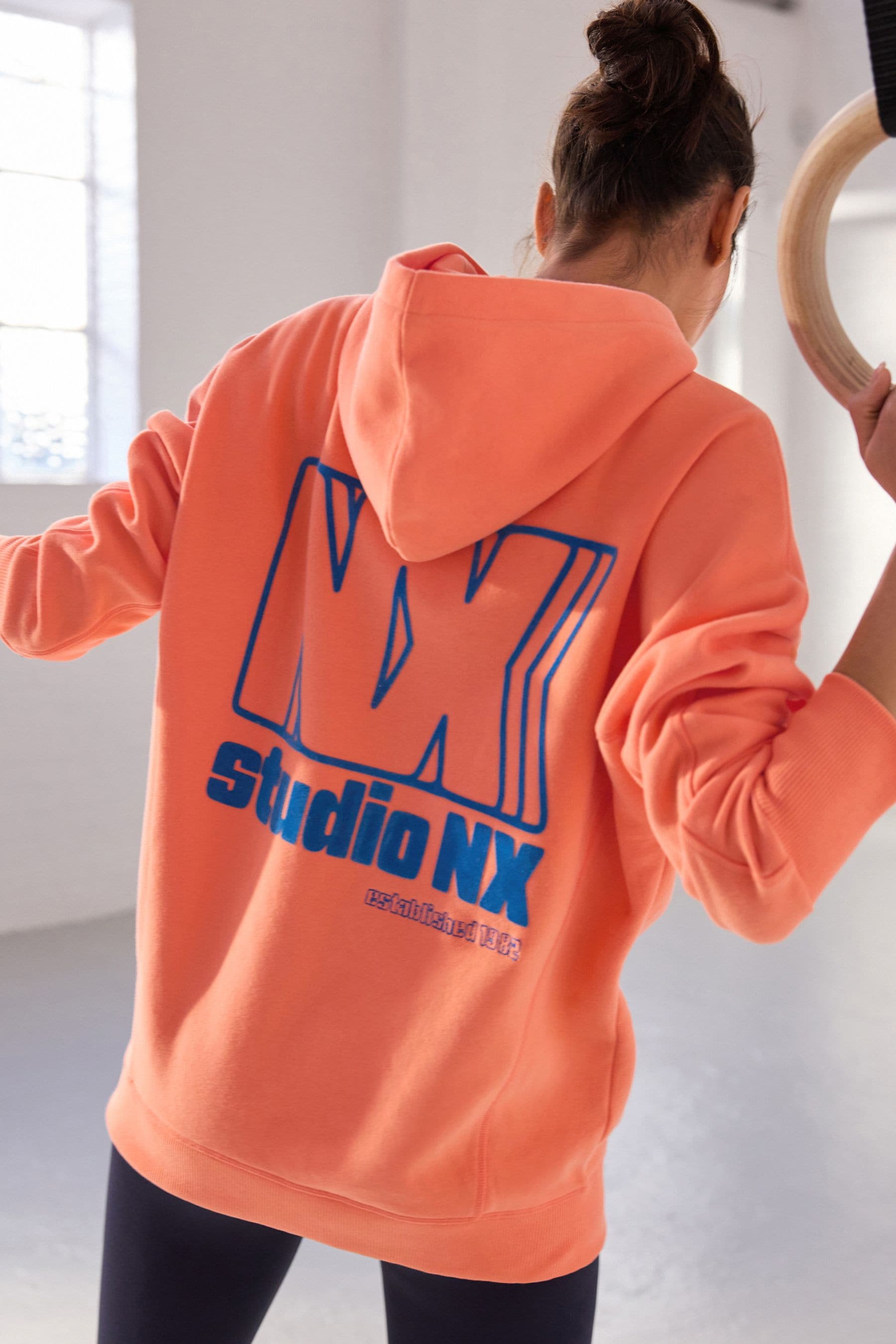 Coral pink hoodie on sale