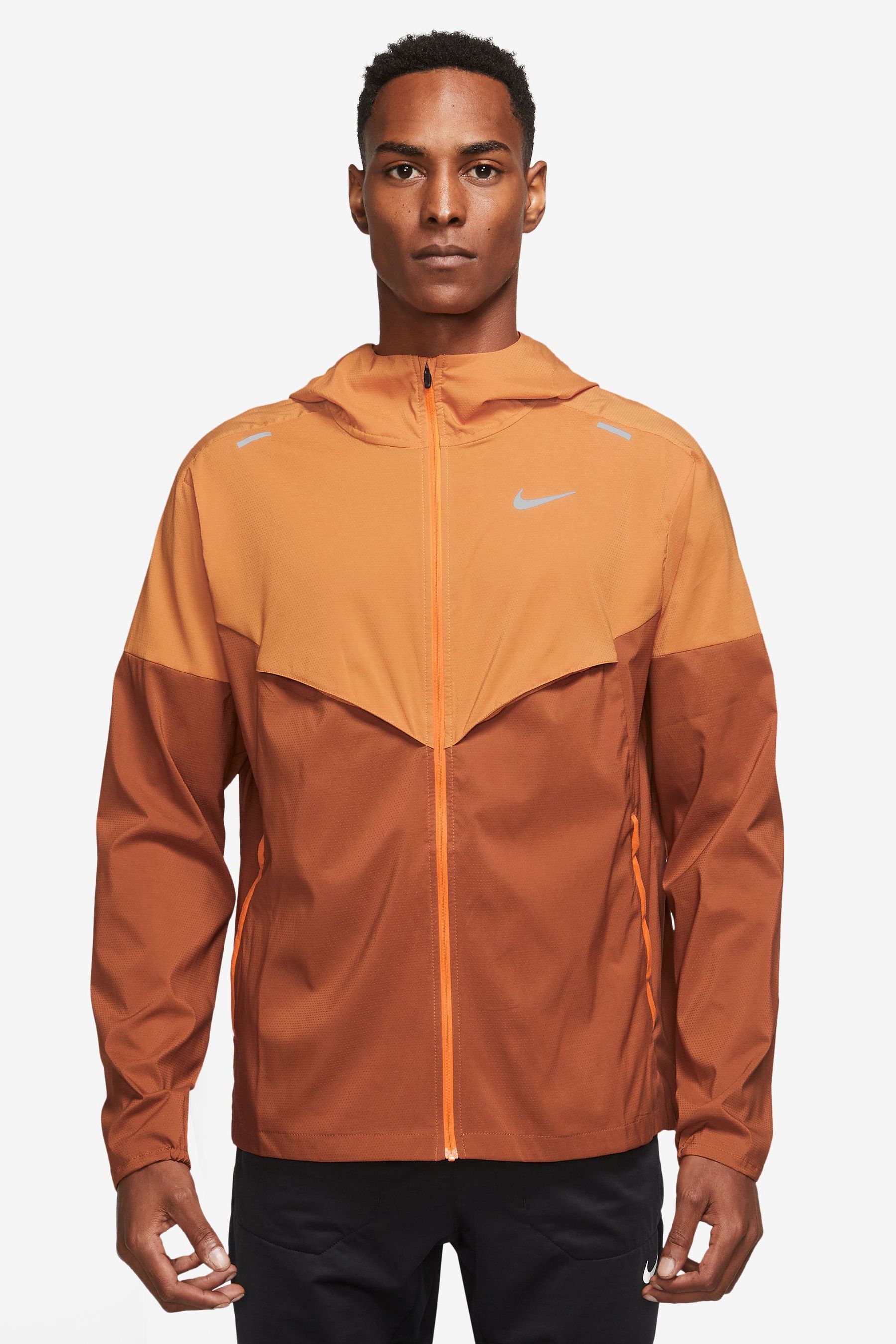 Buy Nike Orange Windrunner Running Jacket from Next Ireland