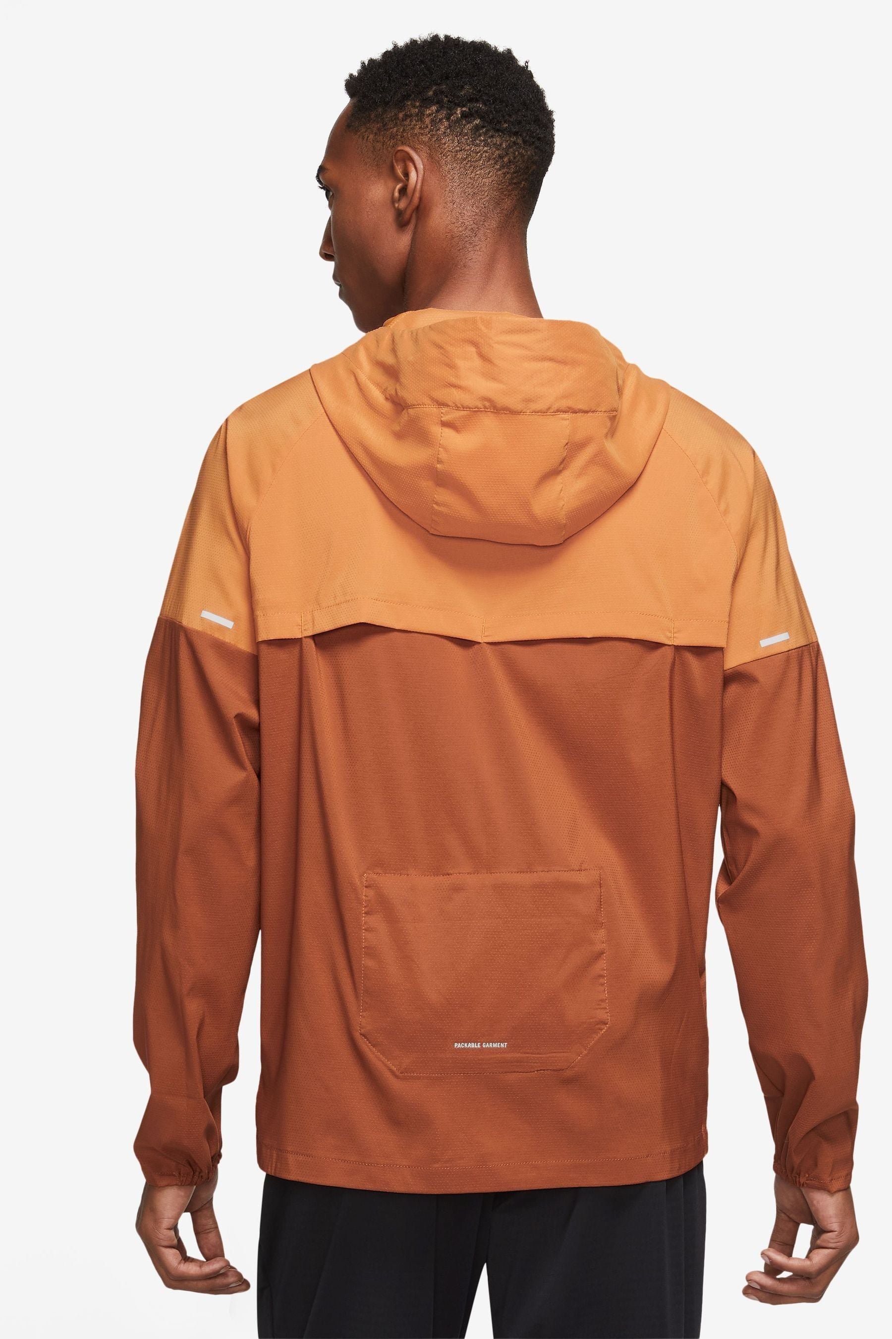 Buy Nike Orange Windrunner Running Jacket from Next Ireland