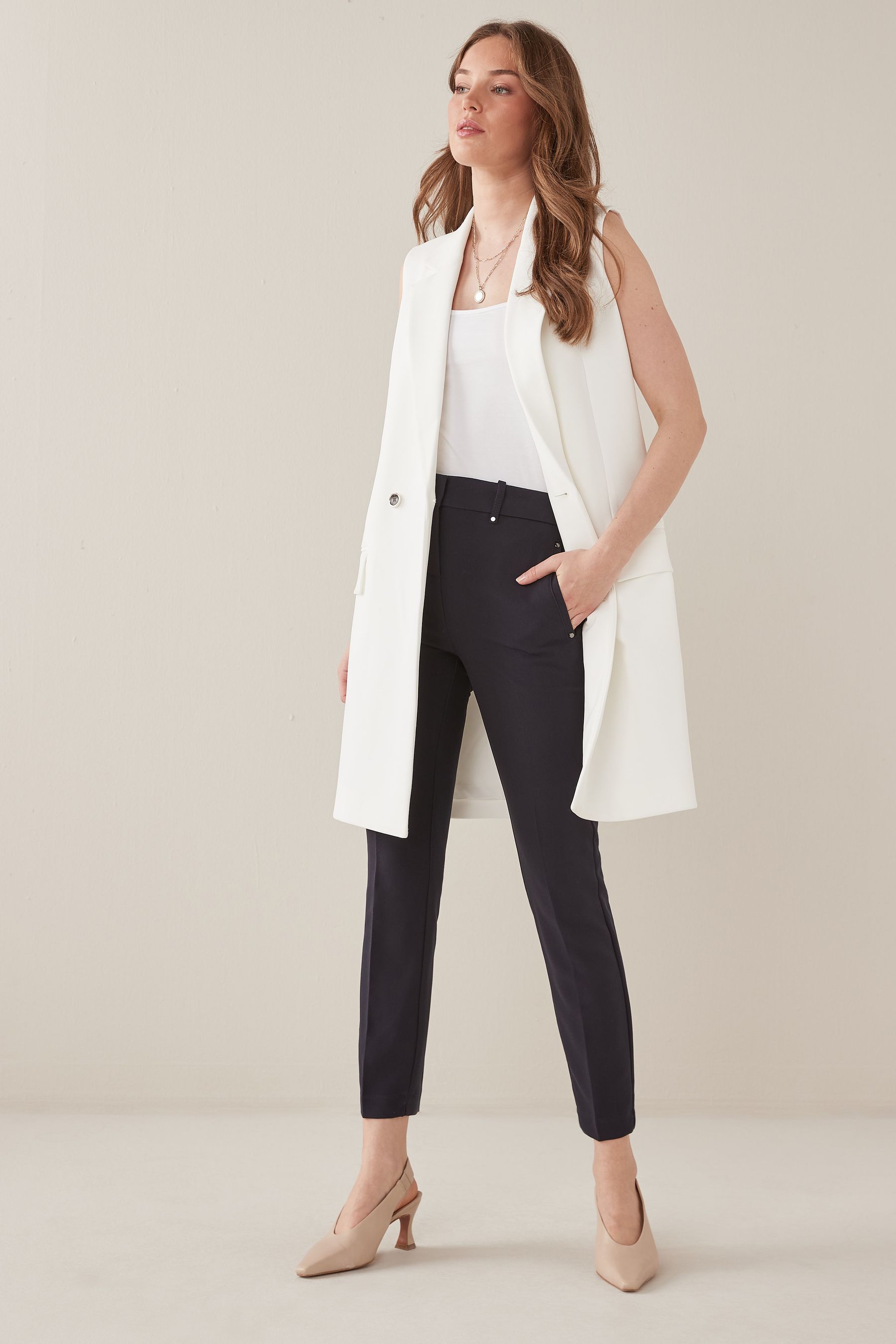 Next slim leg trousers online