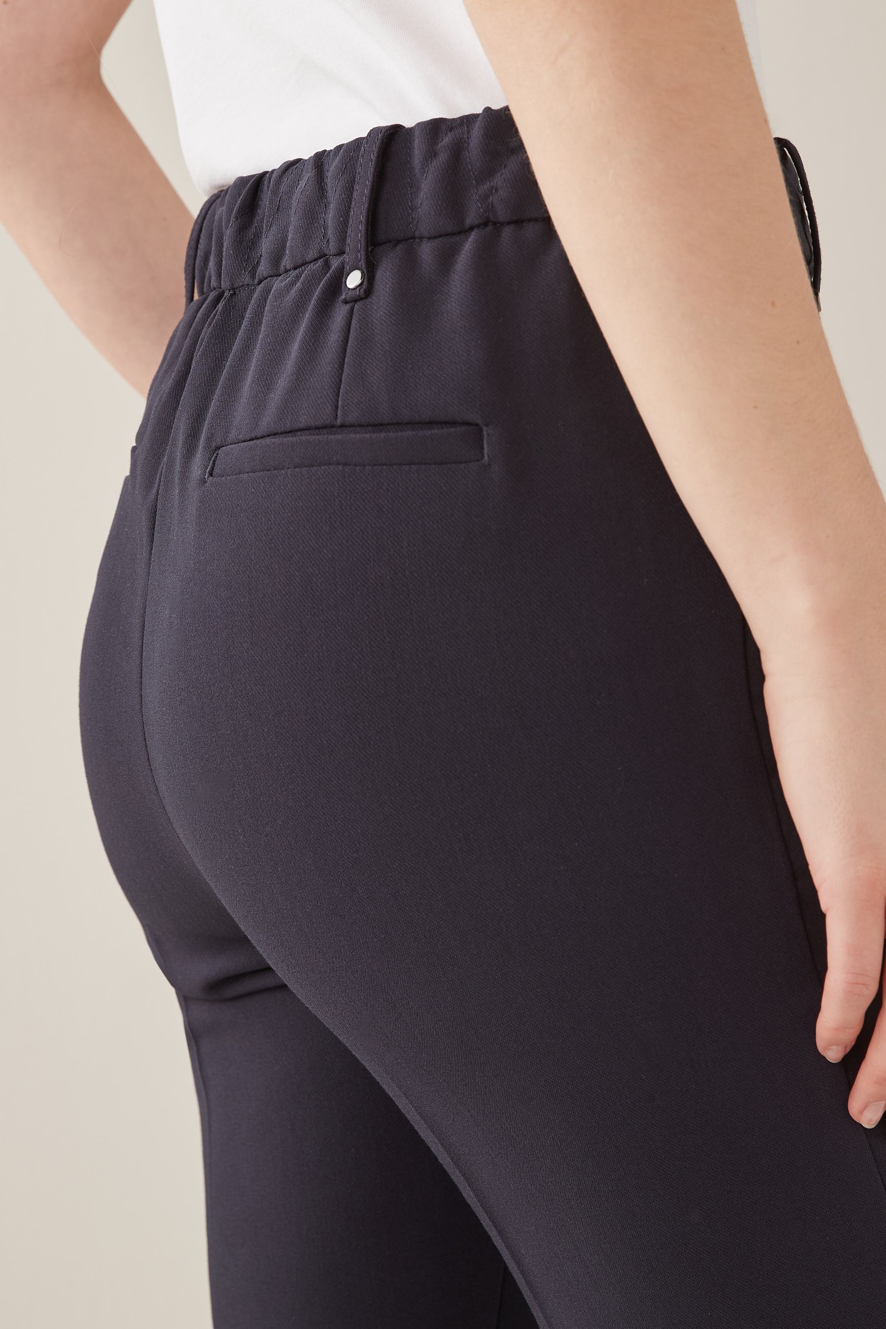 Buy Navy Blue Tailored Elasticated Back Skinny Leg Trousers from Next Luxembourg
