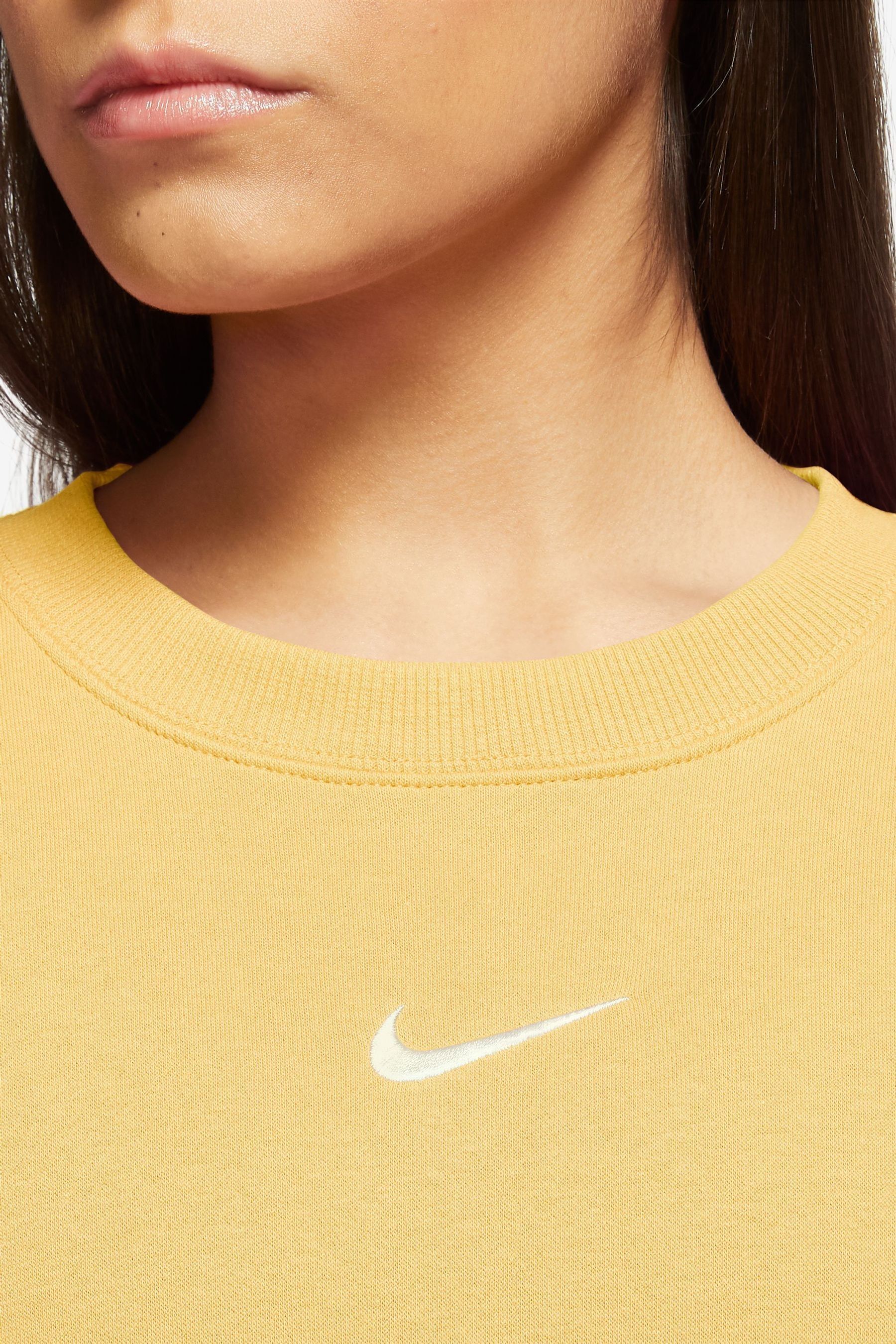 Nike mini swoosh oversized boxy sweatshirt in yello shop