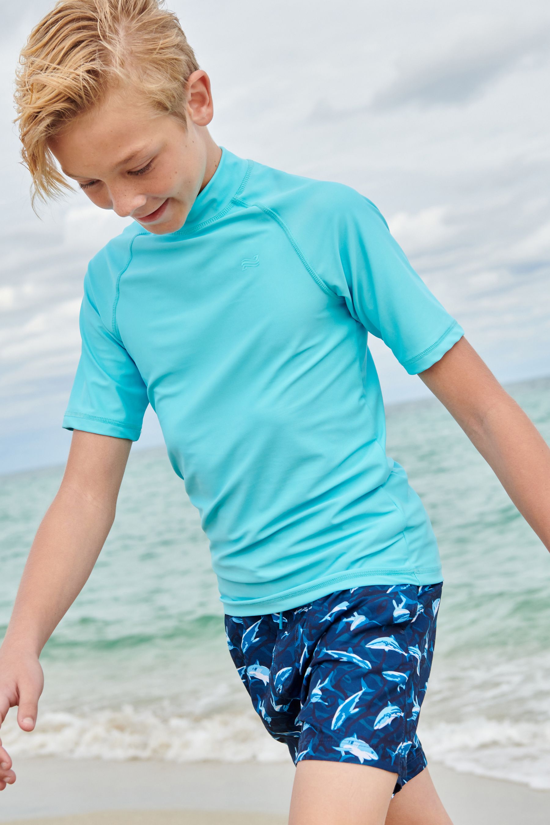 Buy Blue Short Sleeve Sunsafe Rash Vest 1.5 16yrs from Next Canada