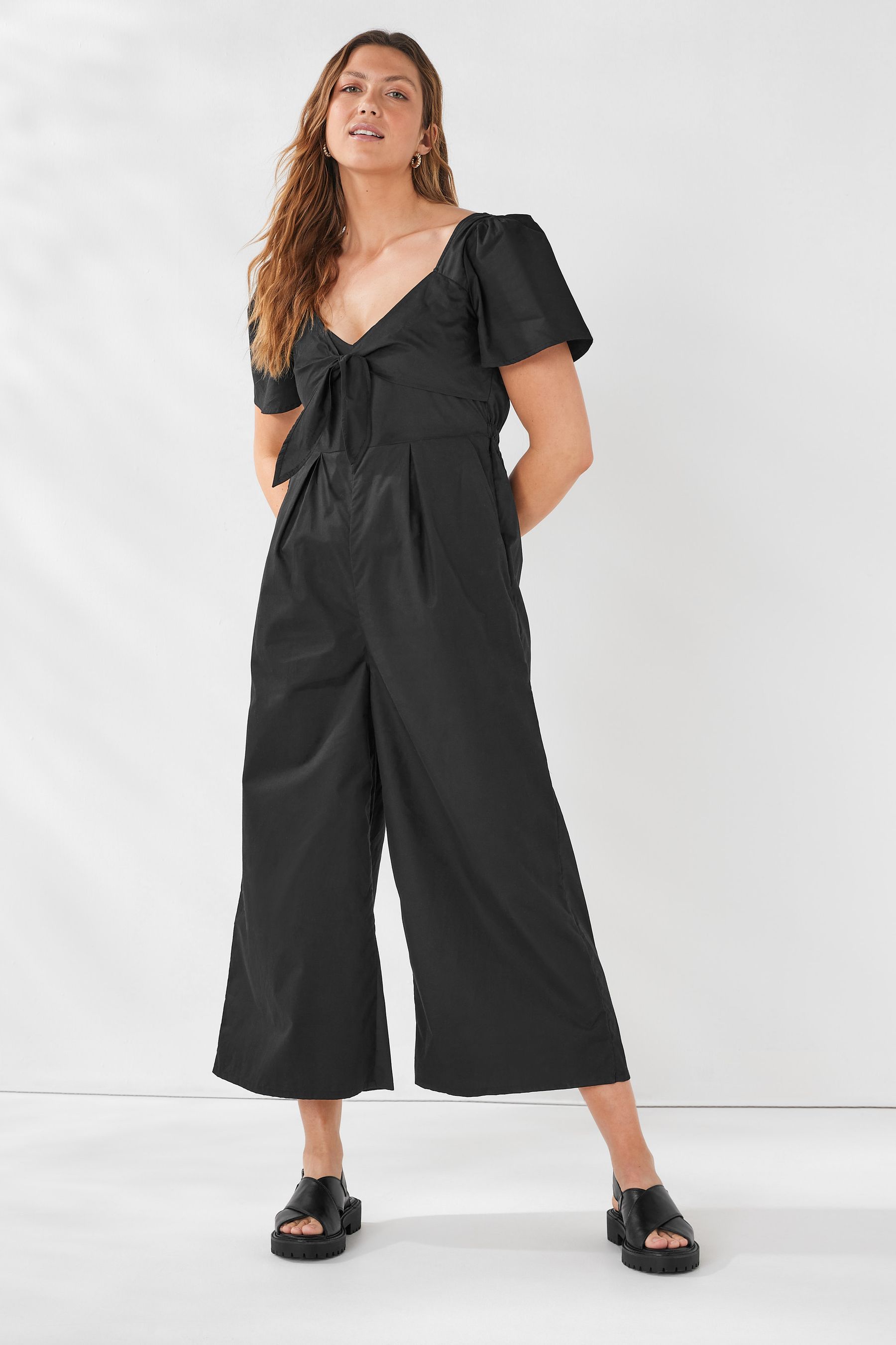 Black tie front jumpsuit best sale