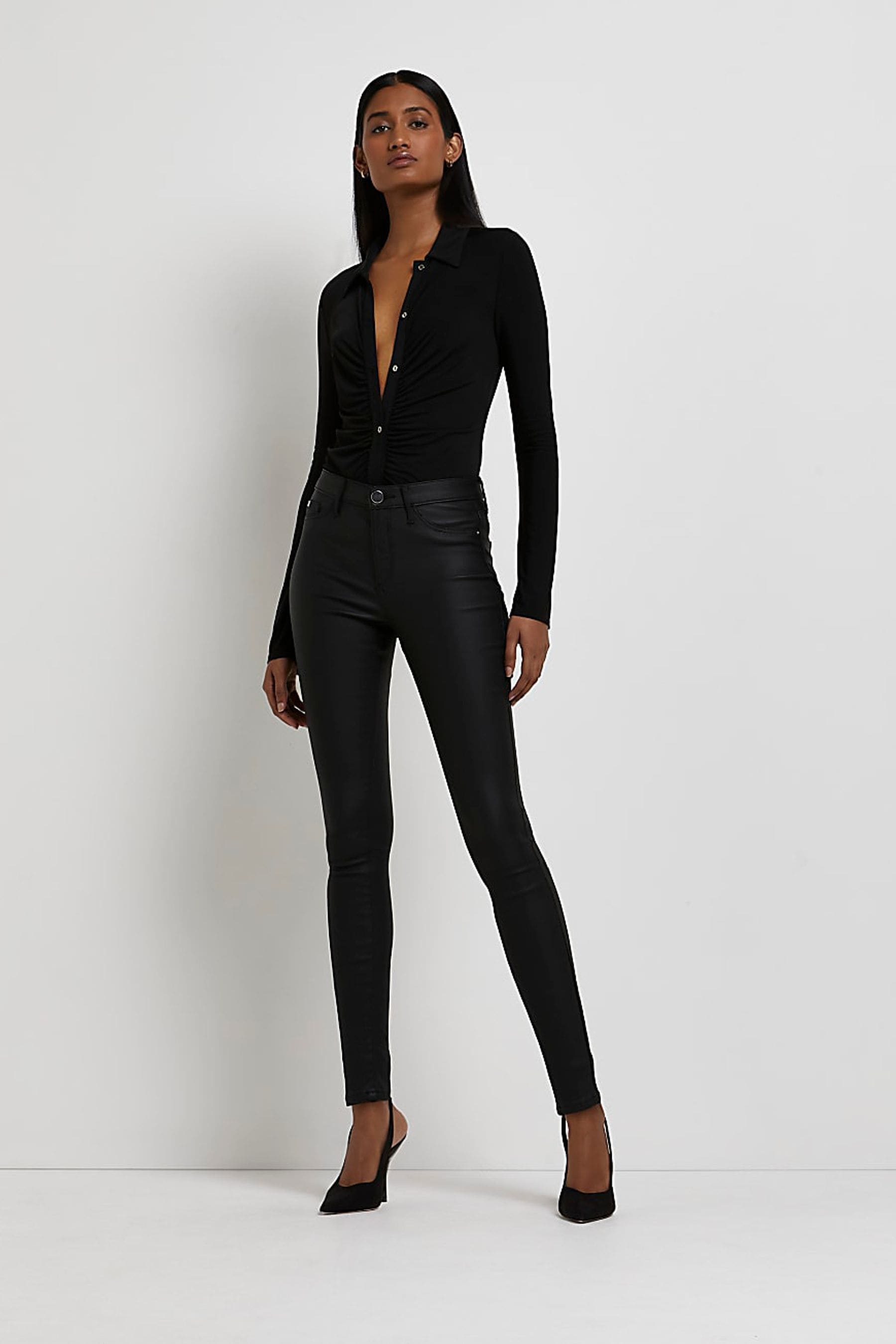 Buy River Island Black Mid Rise Coated Skinny Jeans from Next Ireland
