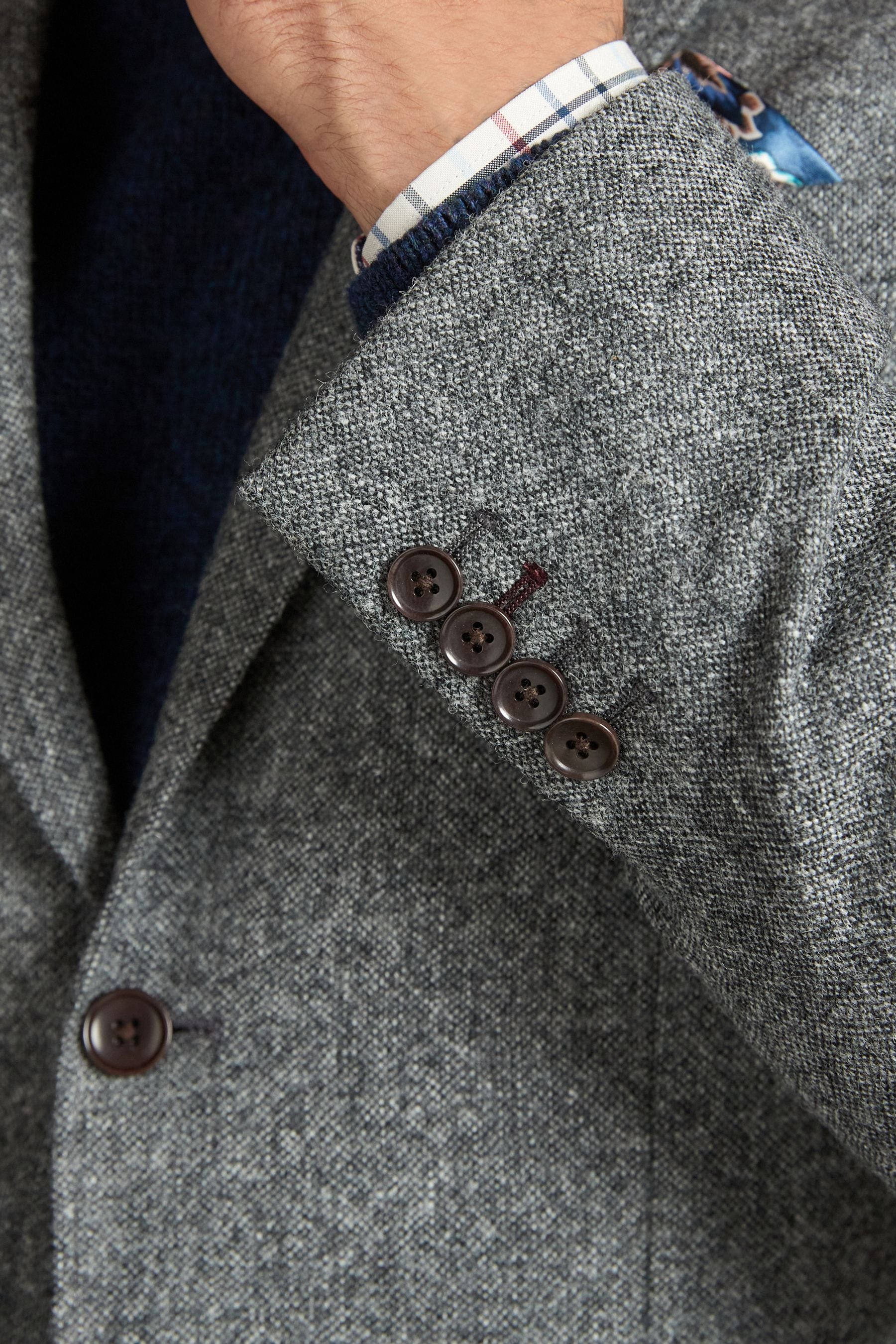 Coat with patch on left arm shop